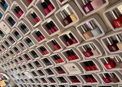 Colorful nail polish display at Maddie's Nail & Beauty Studio in Calne, England, GB.