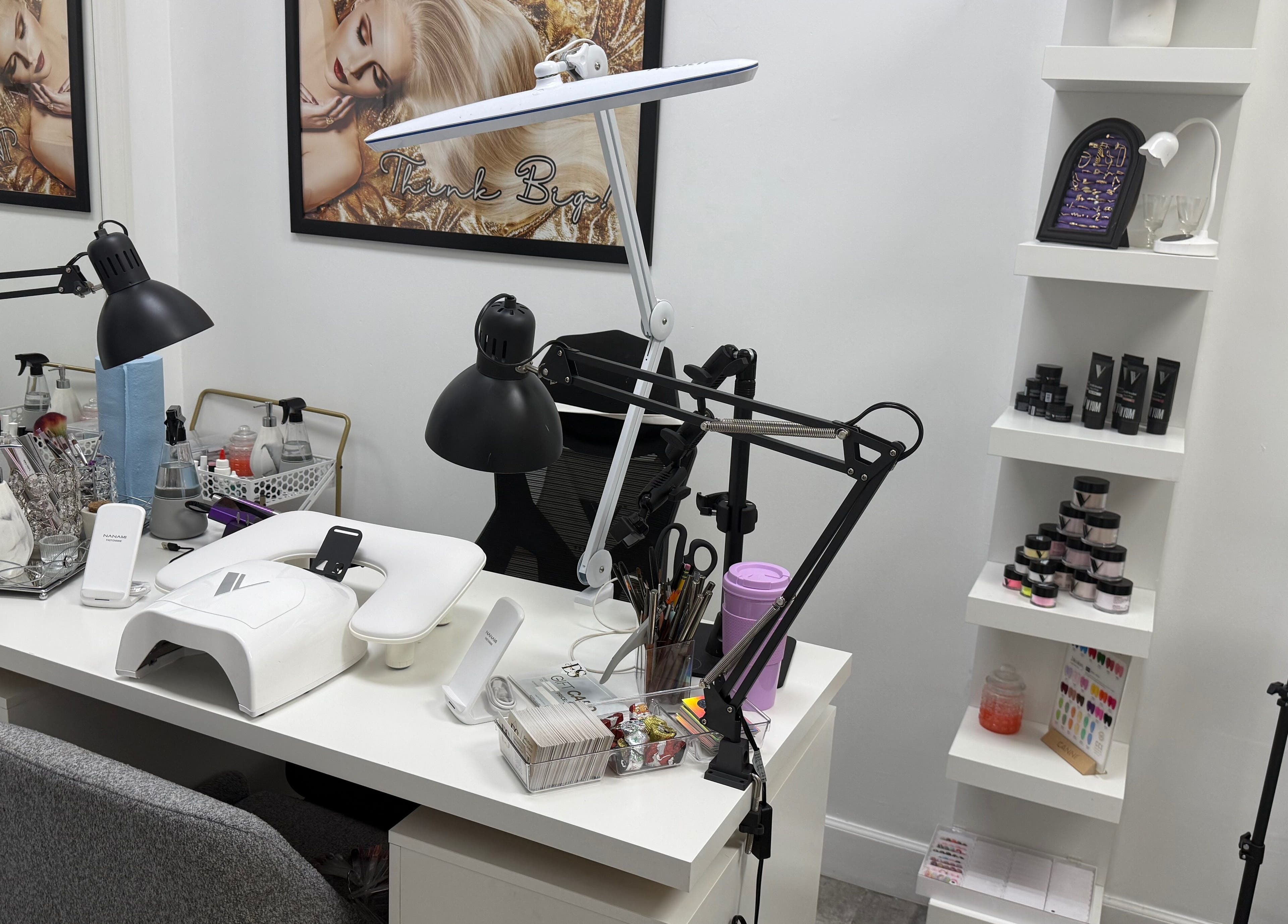 Modern nail station at Eyra Studio Nails, Chandler, Arizona, US, showcasing tools and products neatly organized.