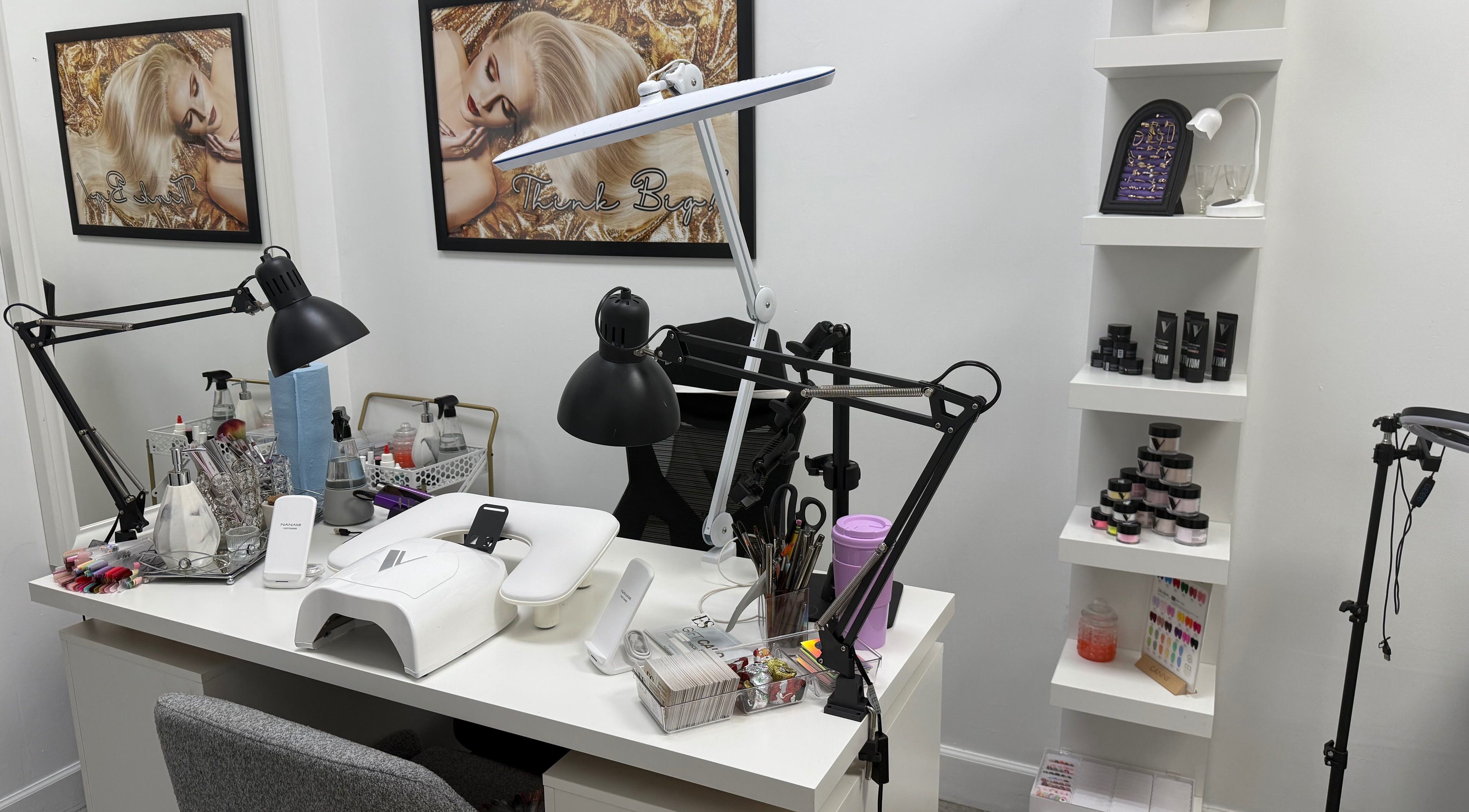 Modern nail station at Eyra Studio Nails in Chandler, Arizona, US featuring chic decor and professional tools.