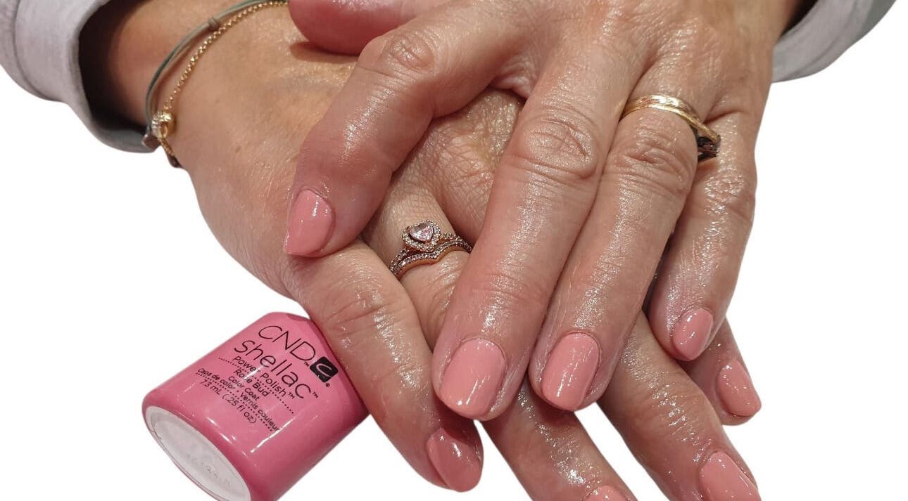 Stylish manicured nails with pink polish at Kebella Beauty Bath Street, Glasgow, Scotland, GB.