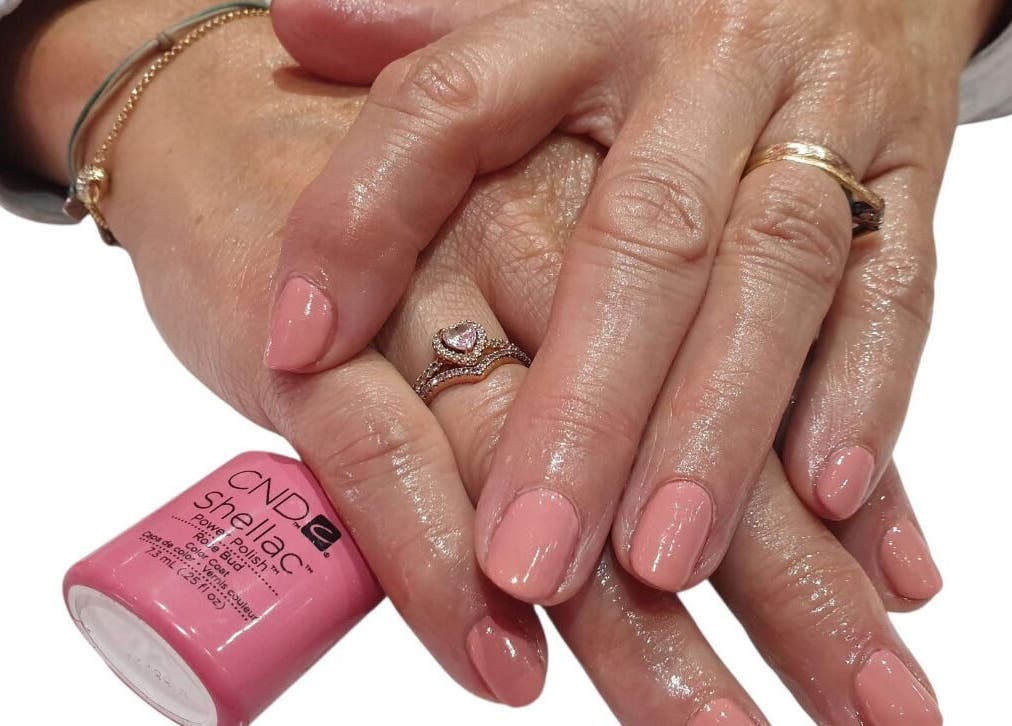 Elegant pink nails polished at Kebella Beauty Bath Street in Glasgow, Scotland, GB showcase a glossy finish.