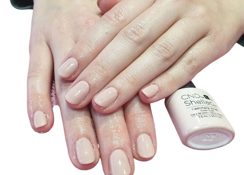Manicured hands showcasing shellac polish at Kebella Beauty Bath Street, Glasgow, Scotland, GB.