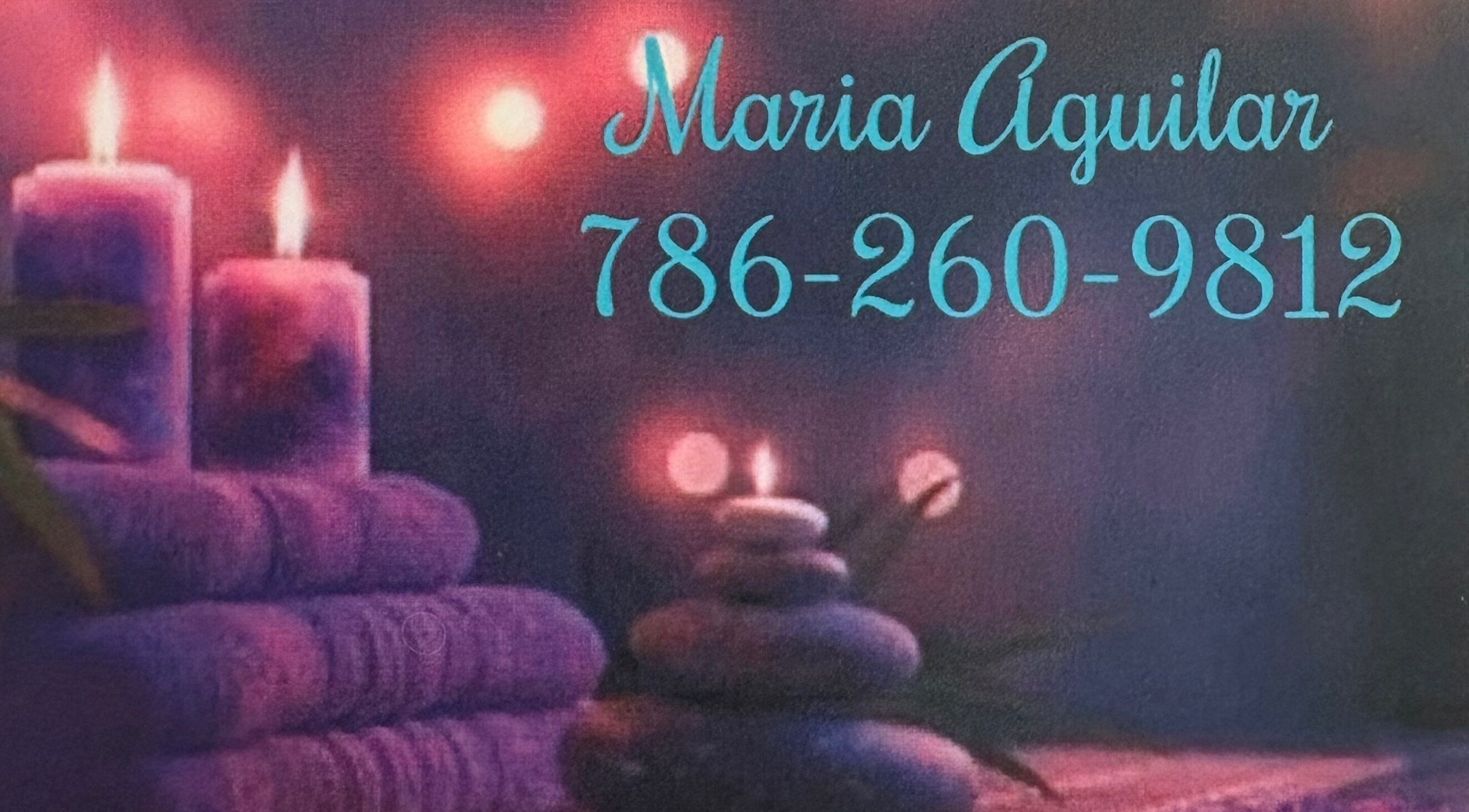 Relaxing candles and stones setup at Massage María, North Fort Myers, Florida, US.
