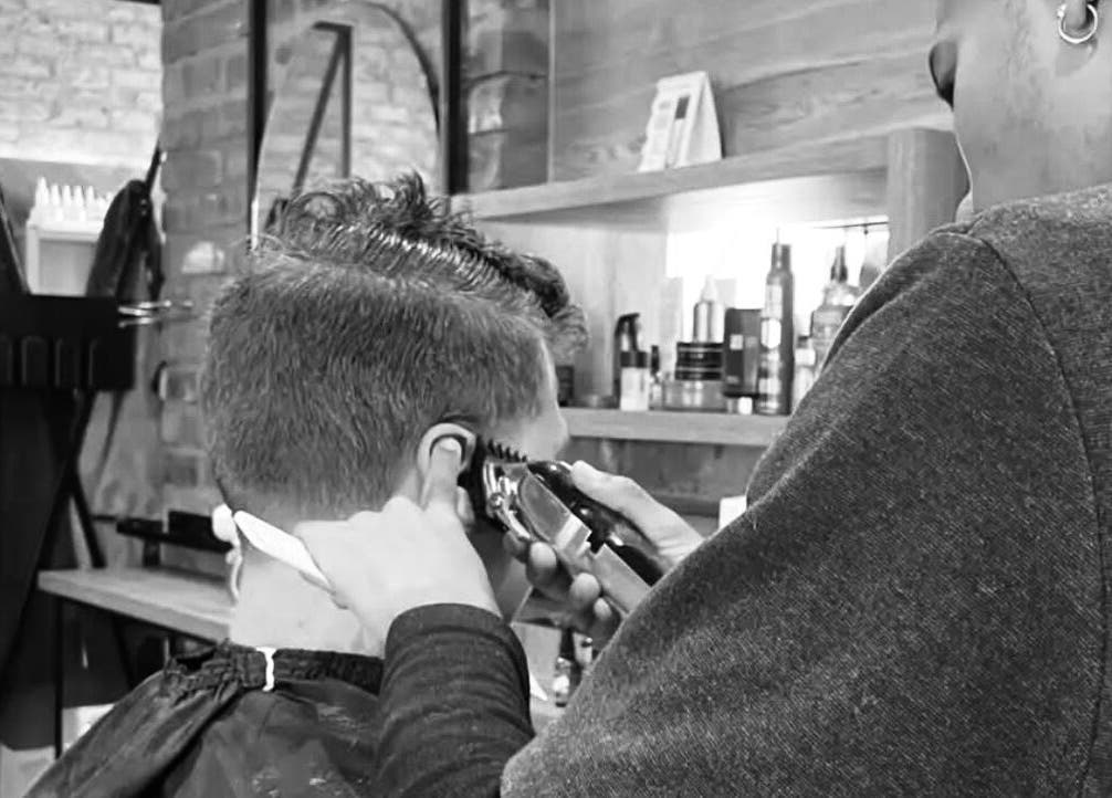 Professional haircut at Xdabarber, Pretoria, Gauteng, ZA, showcasing skilled clipper work.
