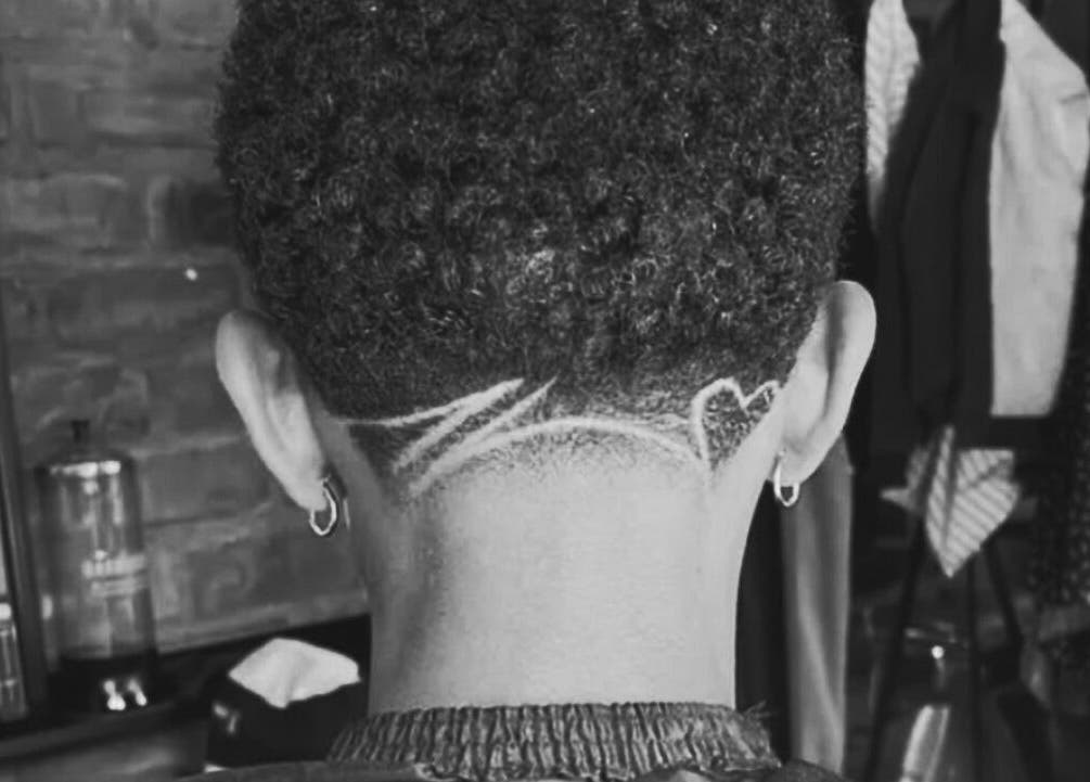 Modern undercut design at Xdabarber in Pretoria, Gauteng, ZA, showcasing unique barbering artistry.