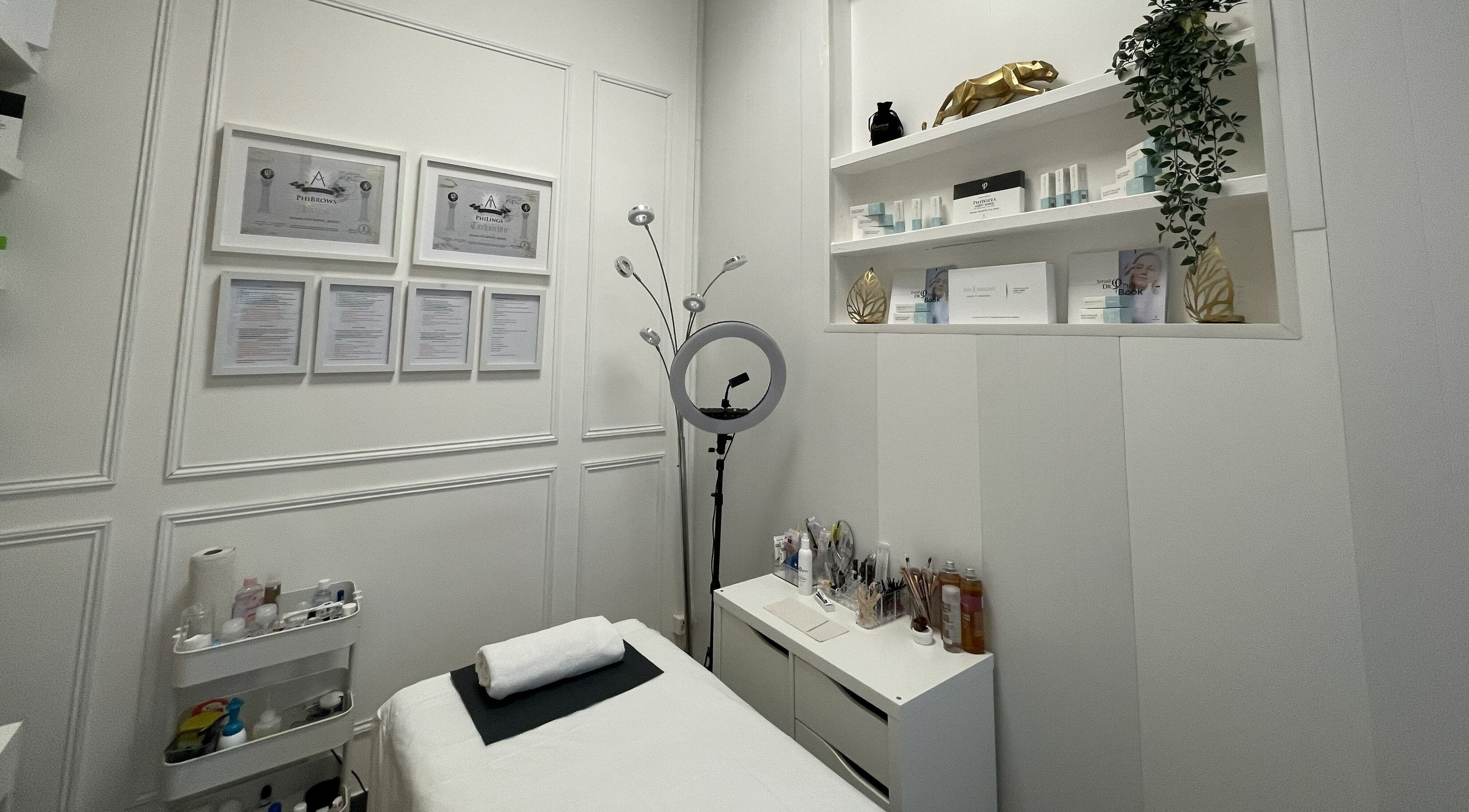 Elegant treatment room at JVB Beauty & the Brows, Genève, Genève, CH featuring calming décor and beauty essentials.