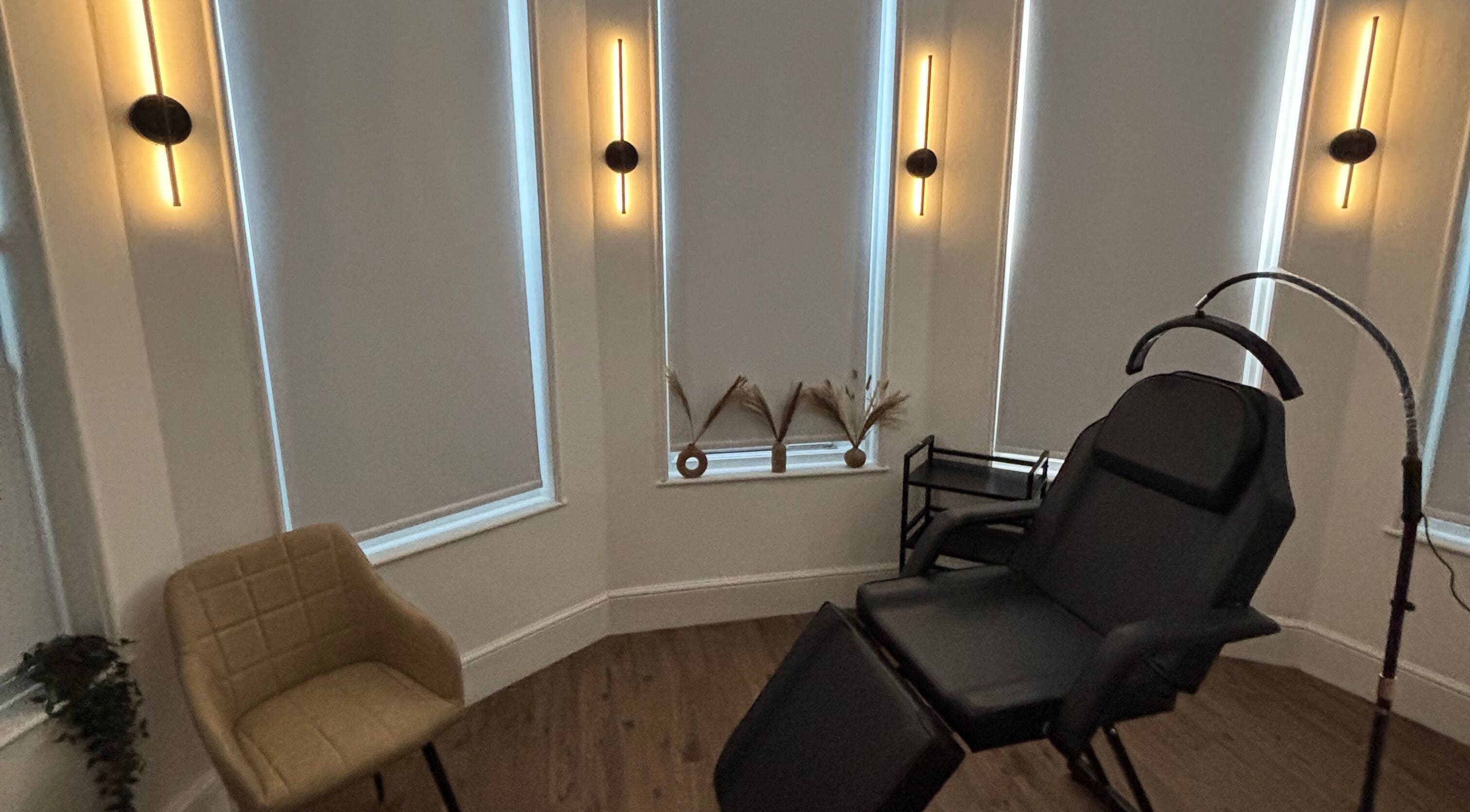 Relaxing therapy room at Apricity Healthcare in Bristol, England, GB, featuring a comfortable recliner chair.