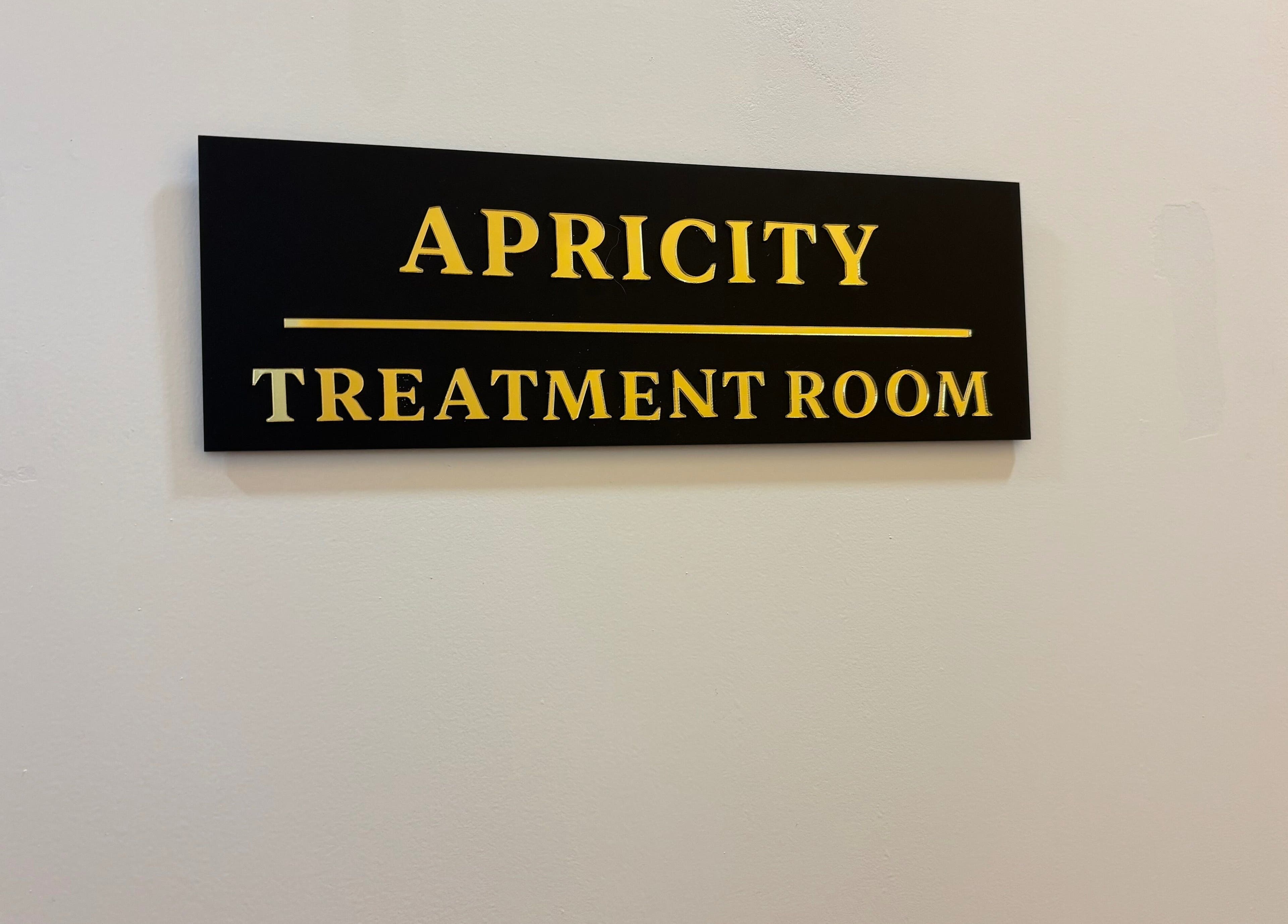 Apricity Healthcare treatment room sign in Bristol, England, GB.