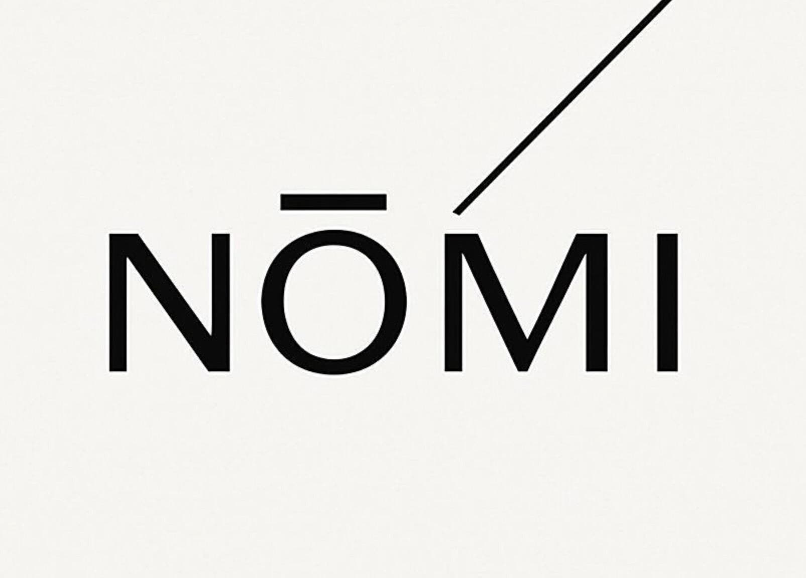 Черно-белый логотип NOMI BEAUTY STUDIO в Кракове, Województwo Małopolskie, PL.