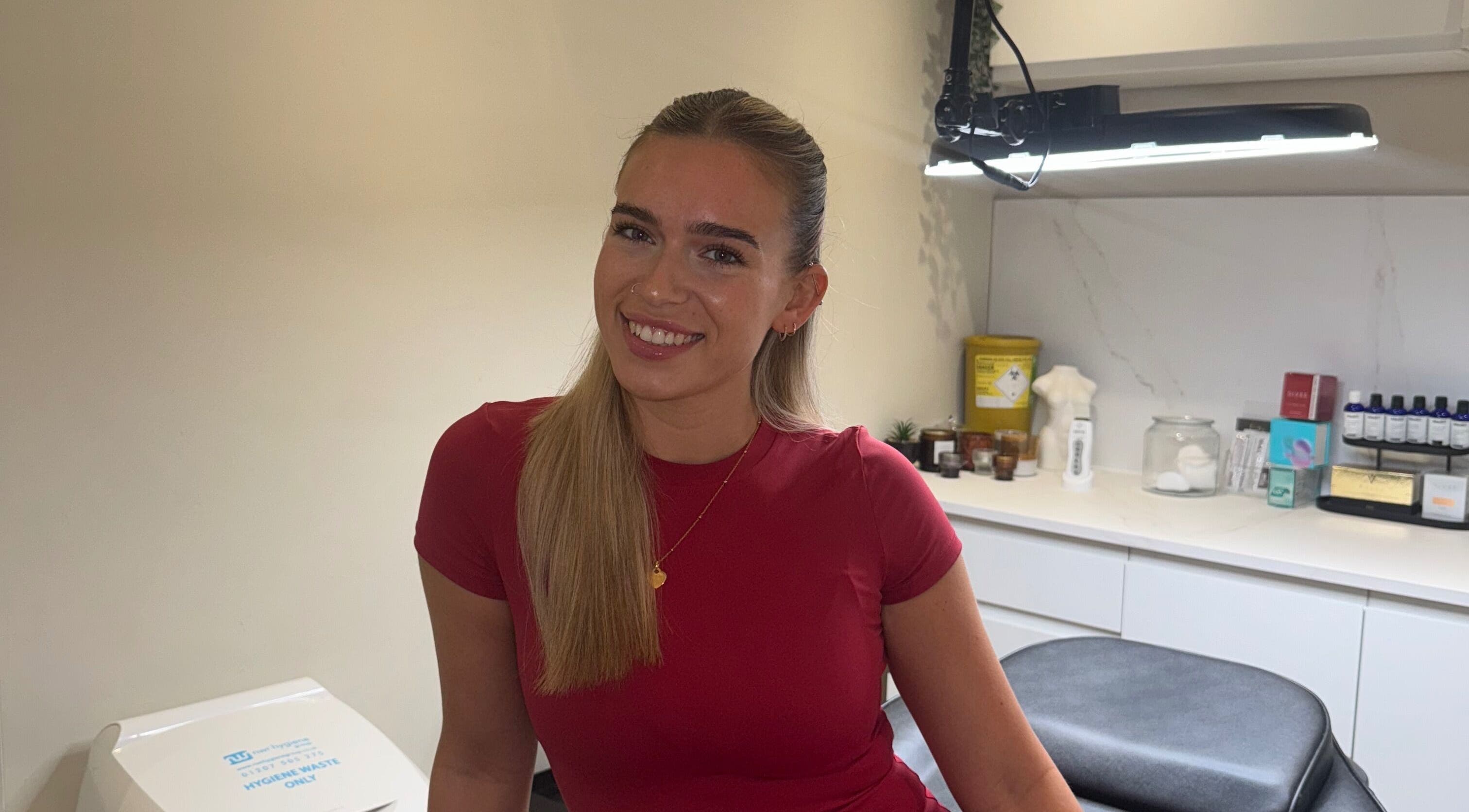 Smiling individual at Beautybyharleyrae, North Shields, England, GB, in a tranquil beauty room.