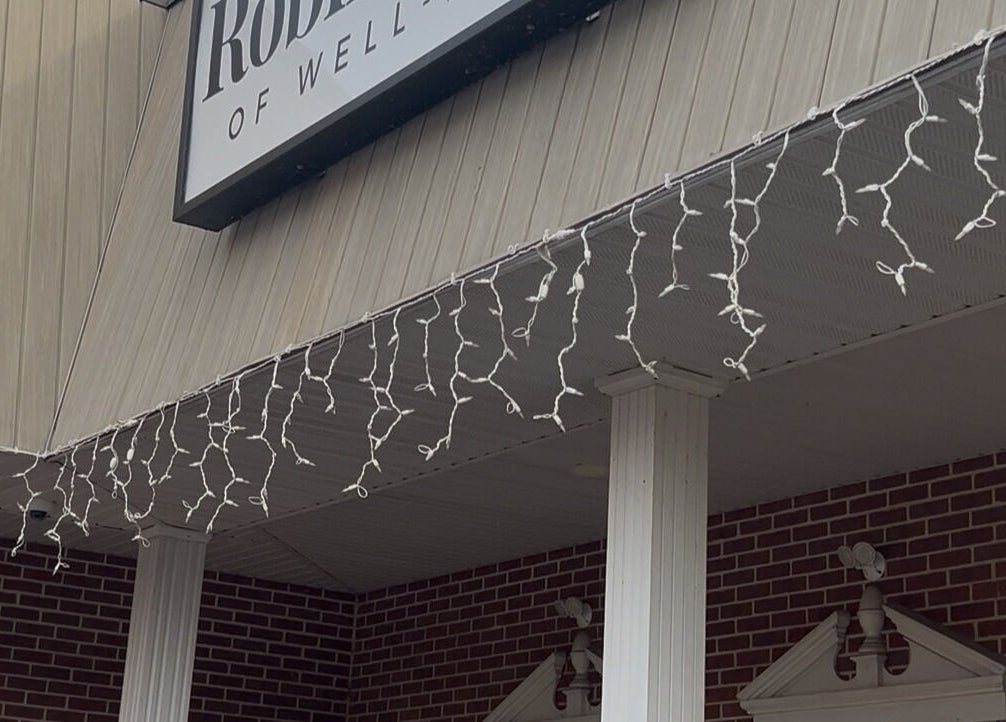 Front of Esthetically Pleasing in Birdsboro, Pennsylvania, US with decorative lights and columns.