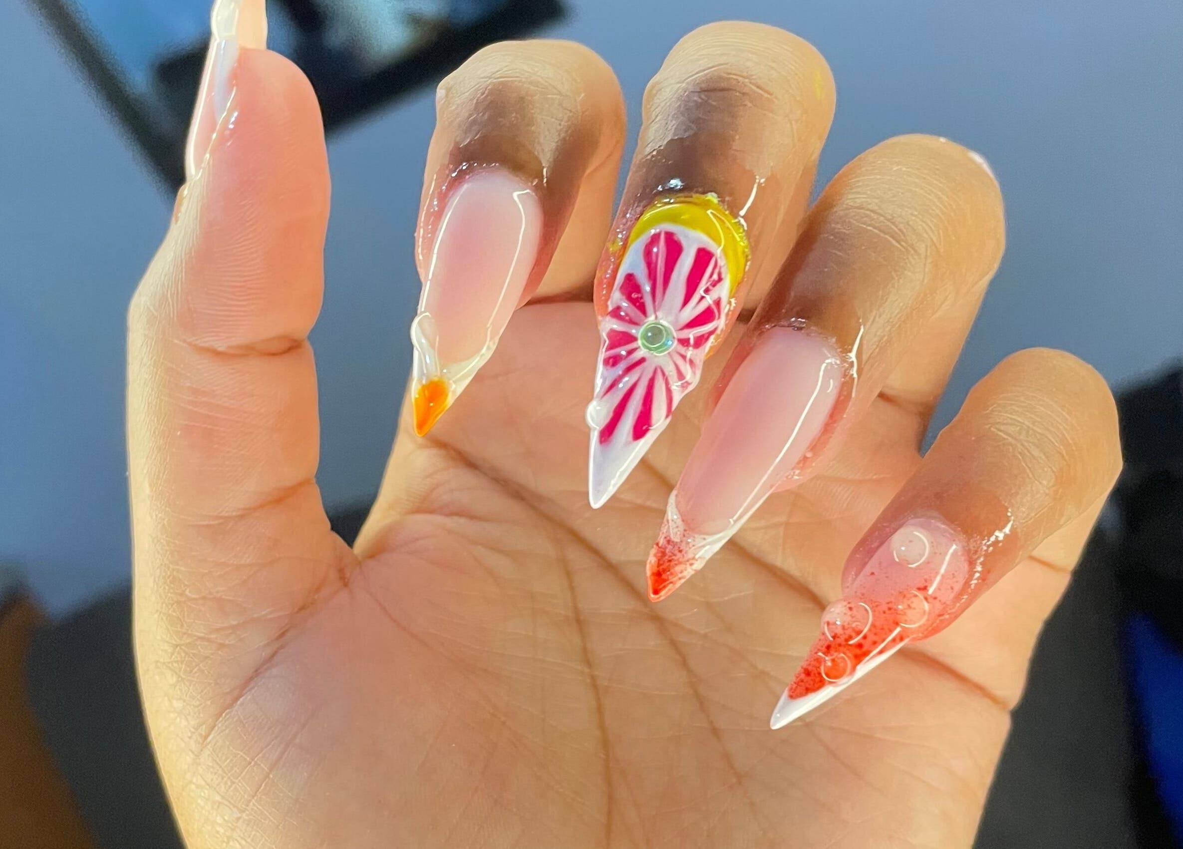 Colorful nail art design at Simply Mirror Beauty Studio, Benoni, Gauteng, ZA.