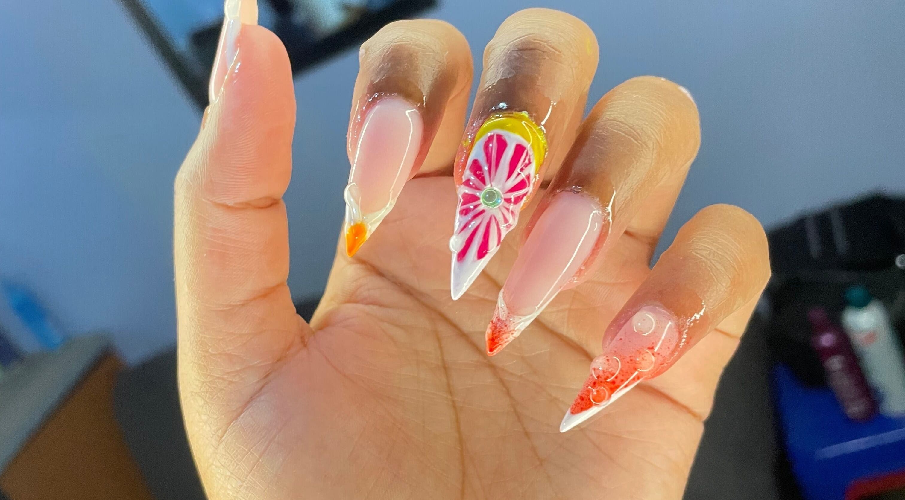 Colorful nail art design at Simply Mirror Beauty Studio, Benoni, Gauteng, ZA.