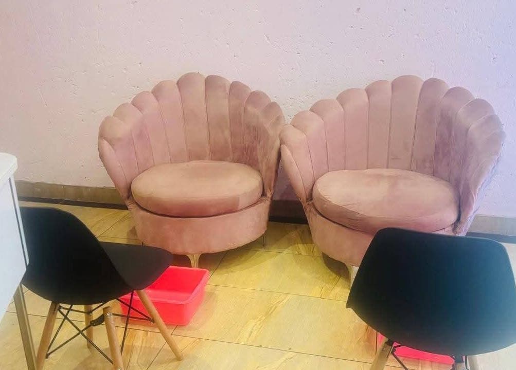 Cozy velvet seating area at OJ Beauty Spa, Johannesburg, Gauteng, ZA, ideal for relaxation and comfort.