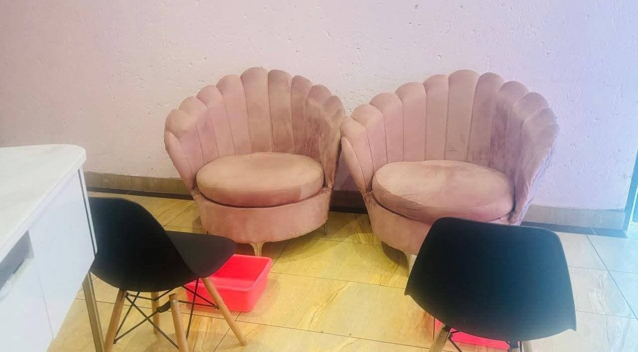 Cozy velvet seating area at OJ Beauty Spa, Johannesburg, Gauteng, ZA, ideal for relaxation and comfort.