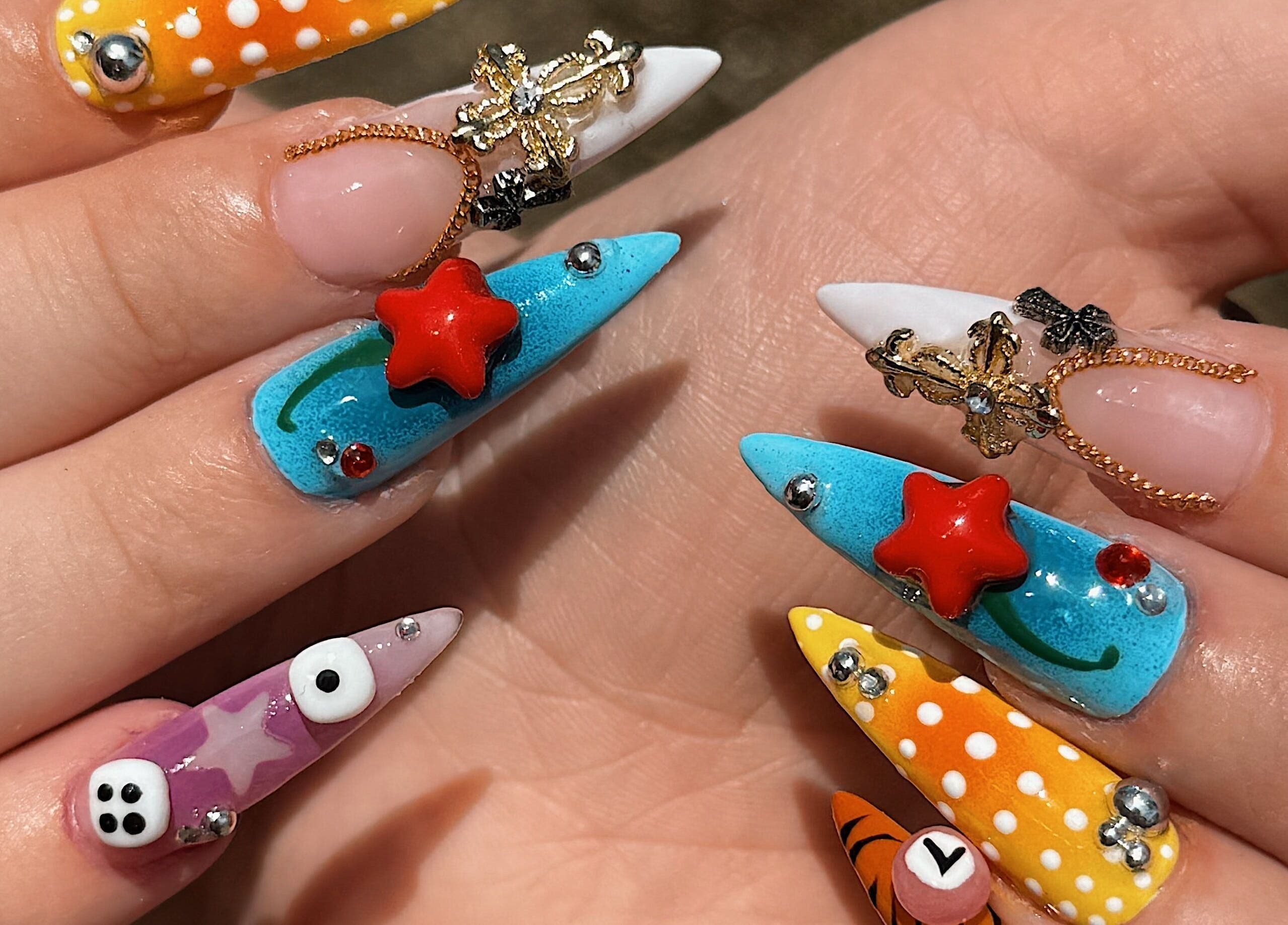 Colorful nail designs with 3D art at Amorist Beauty, Sylvania, New South Wales, AU, showcasing creativity.