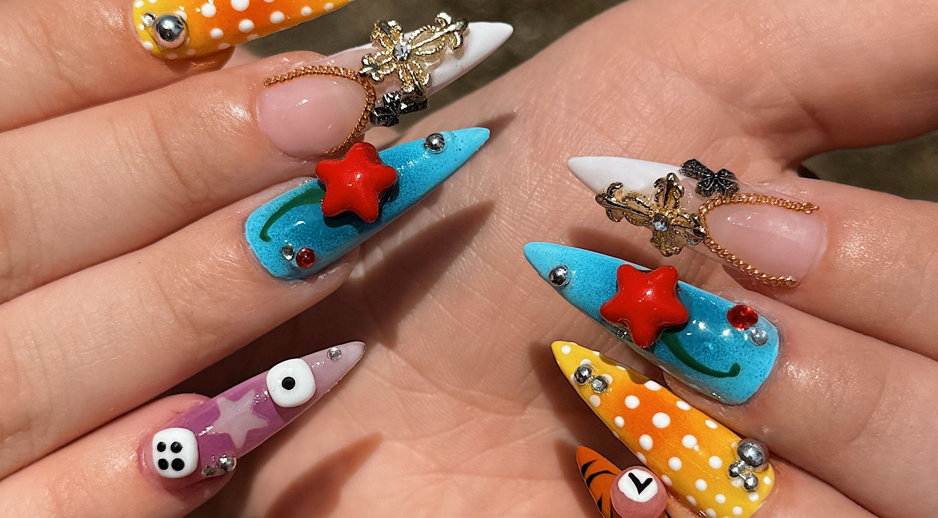 Colorful nail designs with 3D art at Amorist Beauty, Sylvania, New South Wales, AU, showcasing creativity.