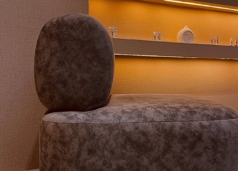 Elegant seating area at Thewinkbeauty, Abuja, Federal Capital Territory, NG, featuring modern decor.