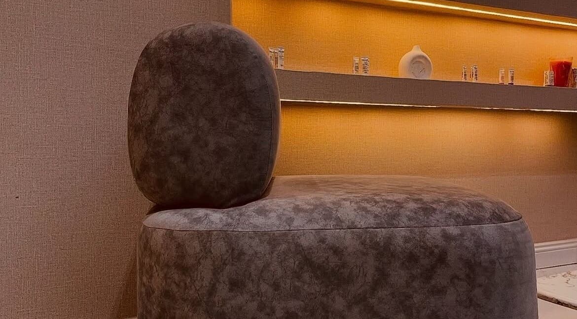 Elegant seating area at Thewinkbeauty, Abuja, Federal Capital Territory, NG, featuring modern decor.