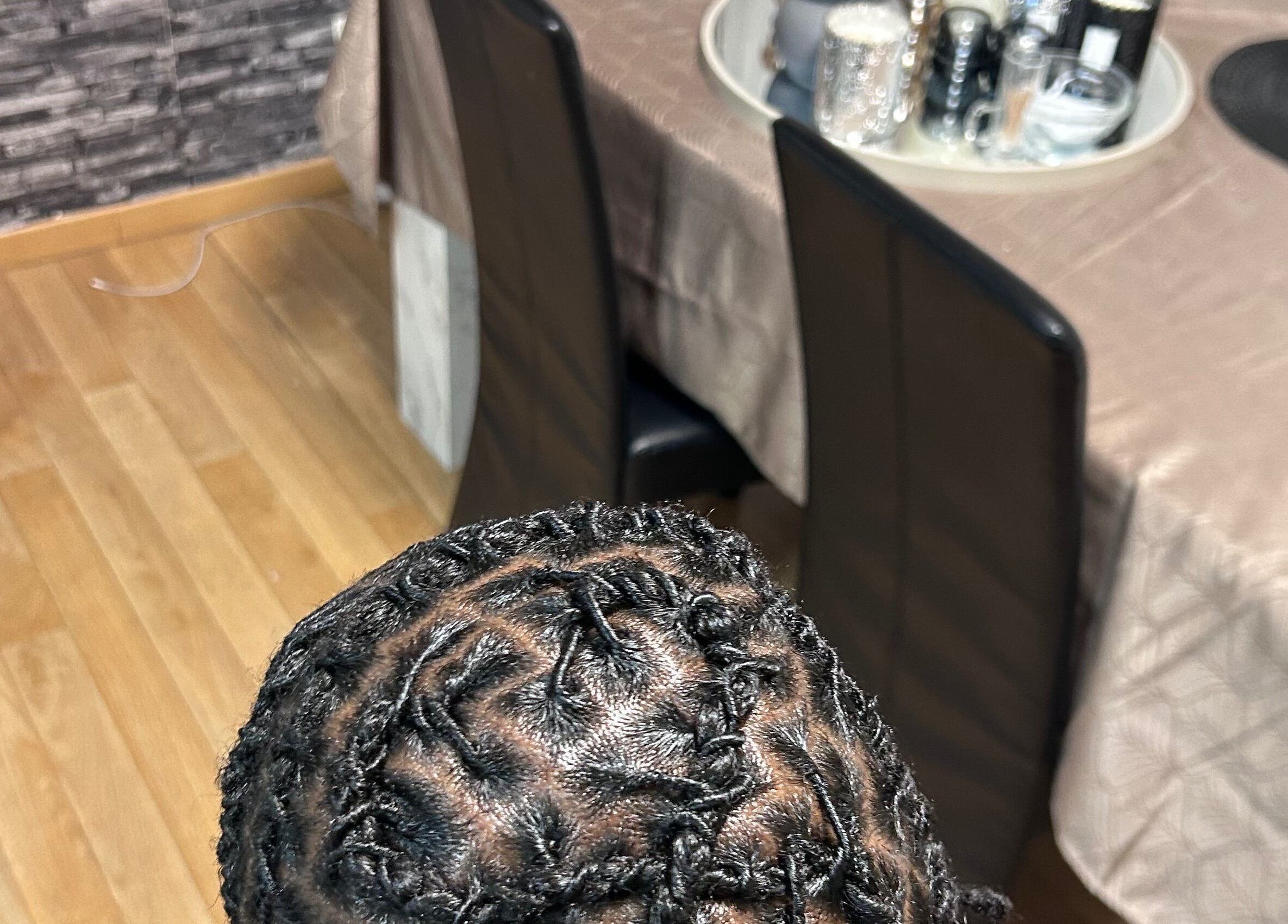Intricate braid style at The LOSK touch! Meise, Vlaanderen, BE showcasing exceptional craftsmanship.