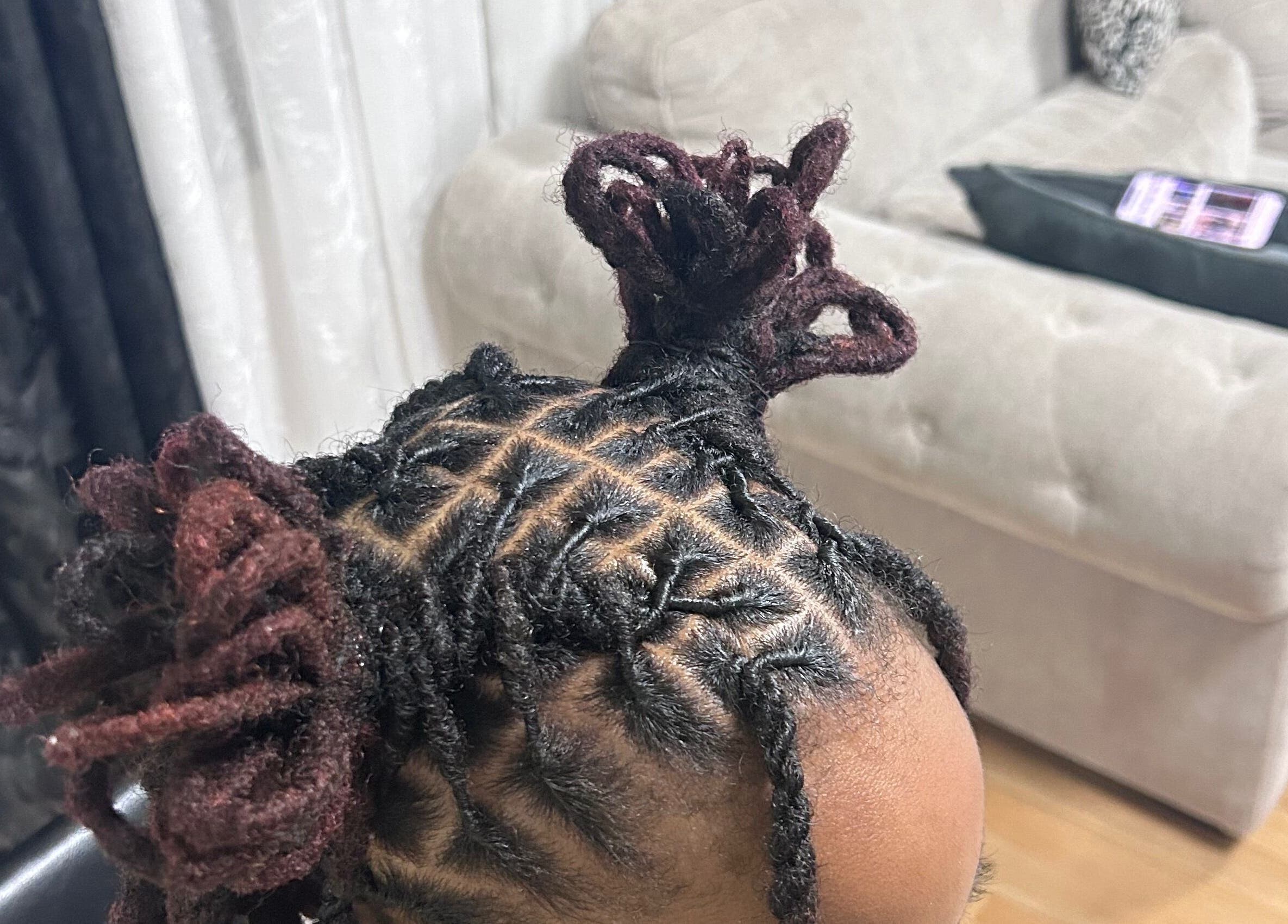 Stylish braids at The LOSK touch! in Meise, Vlaanderen, BE, featuring intricate styling techniques.