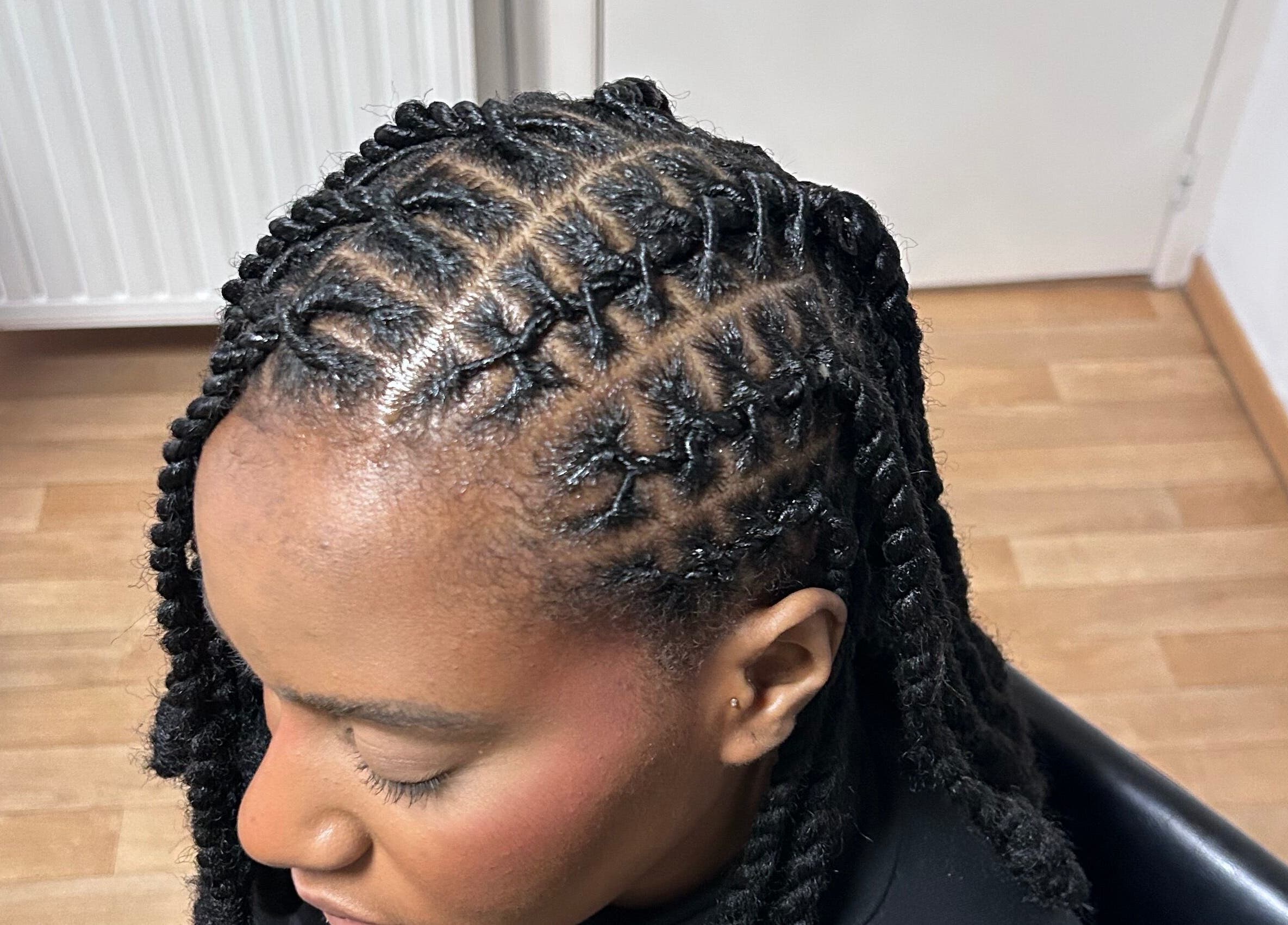 Intricate braided hairstyle at The LOSK touch! salon in Meise, Vlaanderen, BE, showcasing expert styling.