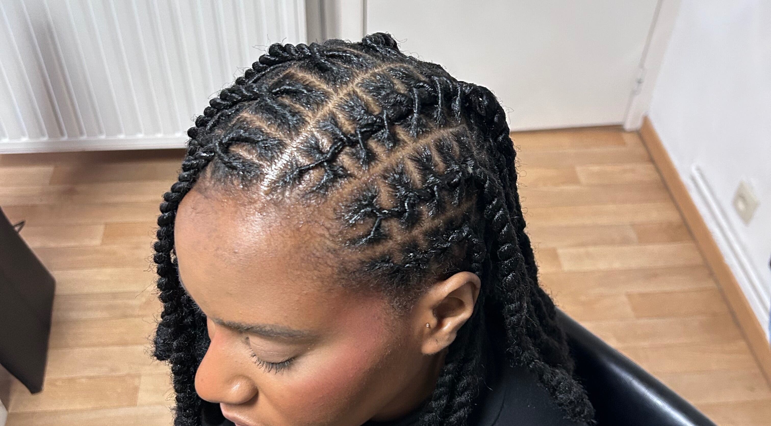 Intricate braided hairstyle at The LOSK touch! salon in Meise, Vlaanderen, BE, showcasing expert styling.