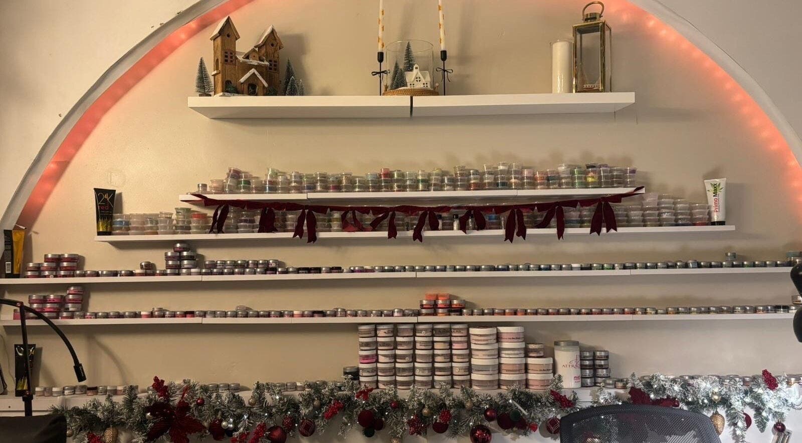 Nmnails_x nail art display at Irlam, England, GB showcasing vibrant polish collection.