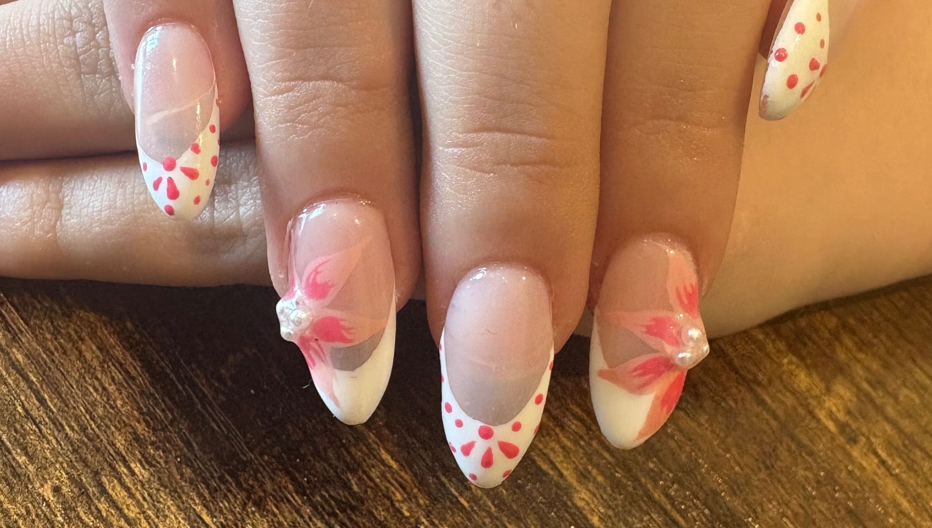 Elegant floral nail art at Nailed It By Ameena, Shrewsbury, England, GB.