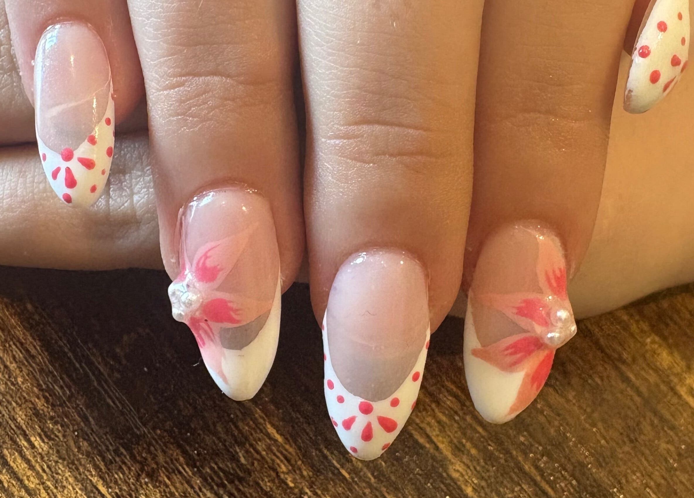 Elegant floral nail art at Nailed It By Ameena, Shrewsbury, England, GB.
