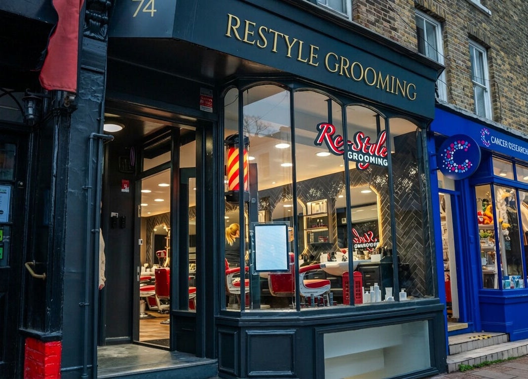 Exterior of Re-Style Highgate, a stylish grooming venue in London, England, GB, with inviting ambiance.