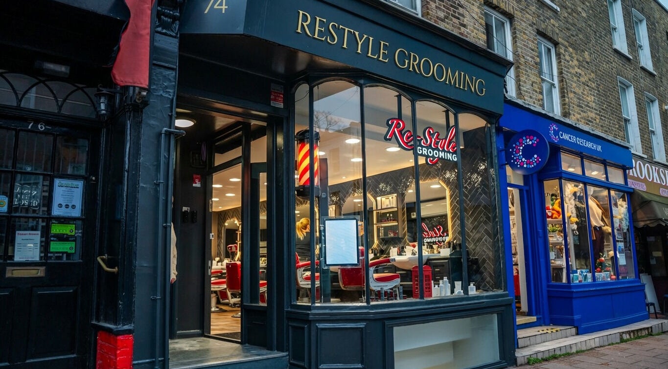 Exterior of Re-Style Highgate, a stylish grooming venue in London, England, GB, with inviting ambiance.