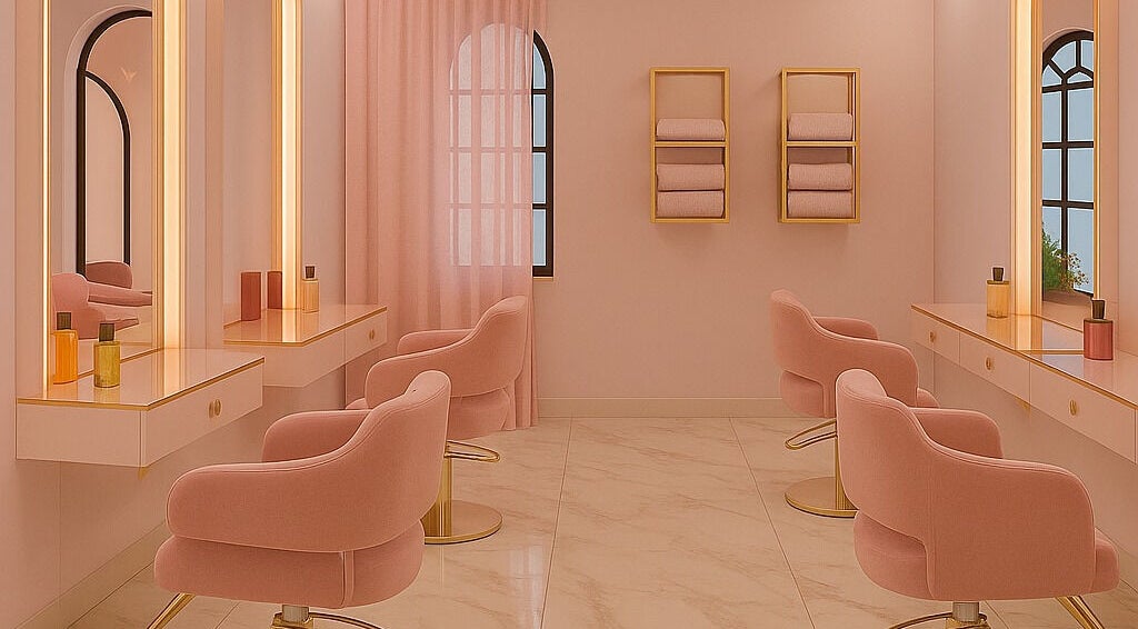 Intérieur sophistiqué de Studio Oholiba Beauty à Bagnolet, Île-de-france, FR, avec fauteuils roses et miroirs éclairés.