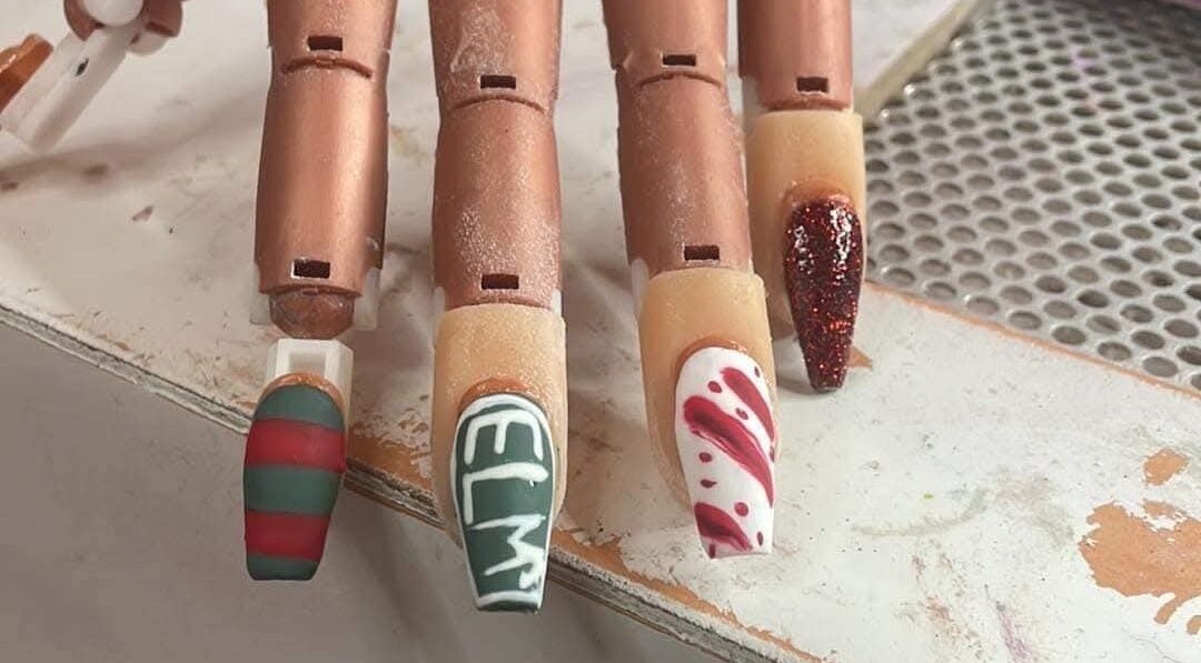 Intricate festive nail designs at Elevated Elegance Beauty, Lovelock, Nevada, US.