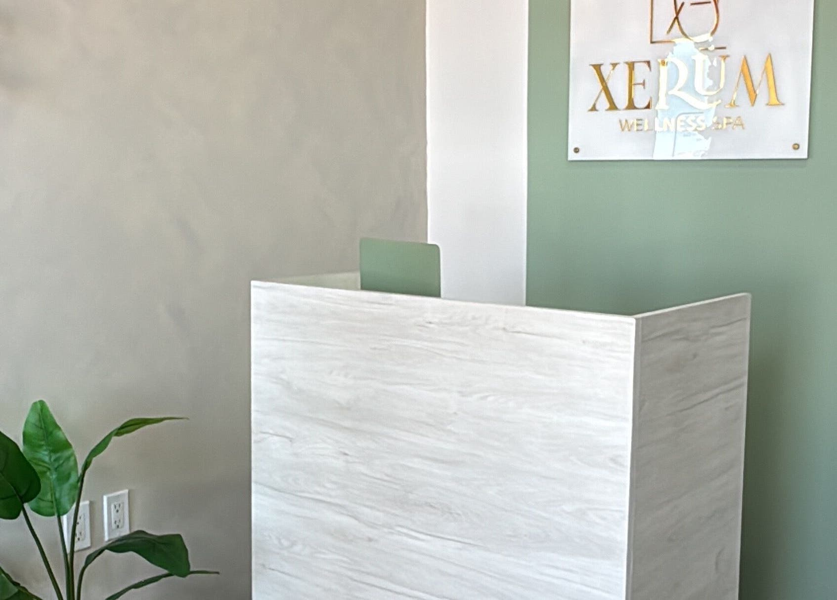 Reception area of XERŪM Wellness Spa in Tijuana, Baja California, MX with minimalist decor.