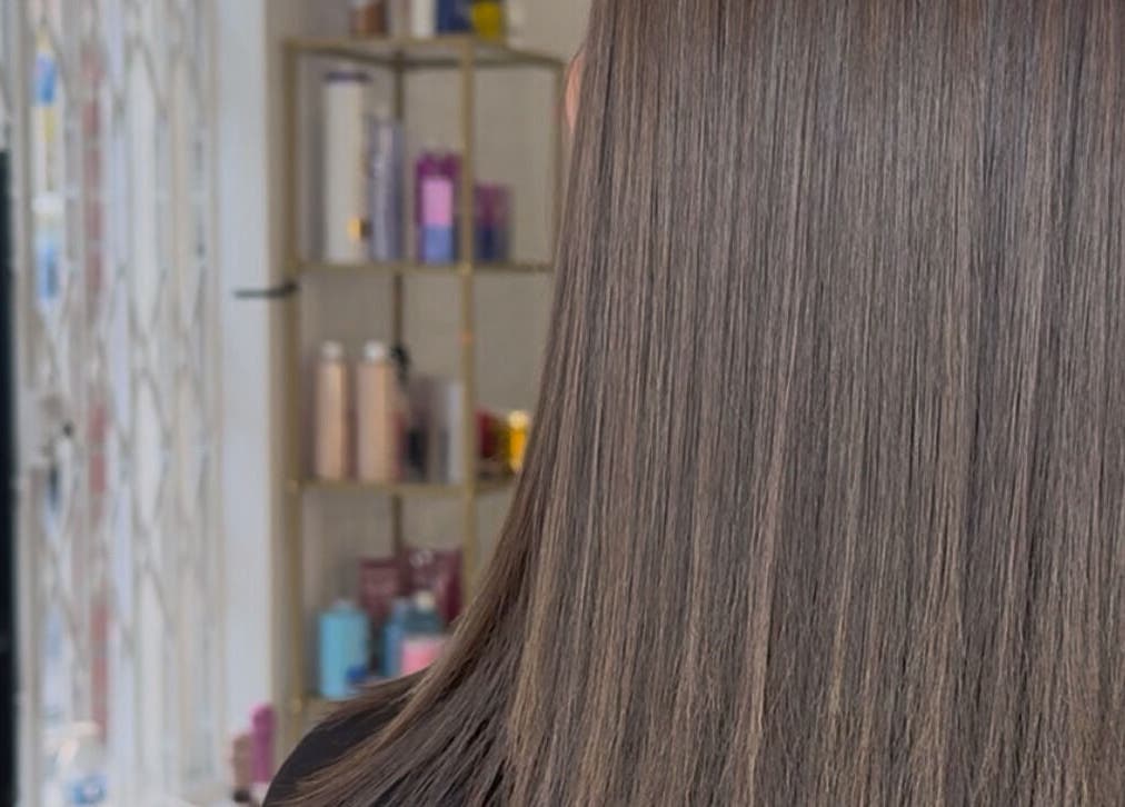 Sleek, straightened hair after a keratin treatment at Keratin House in Littlehampton, England, GB.