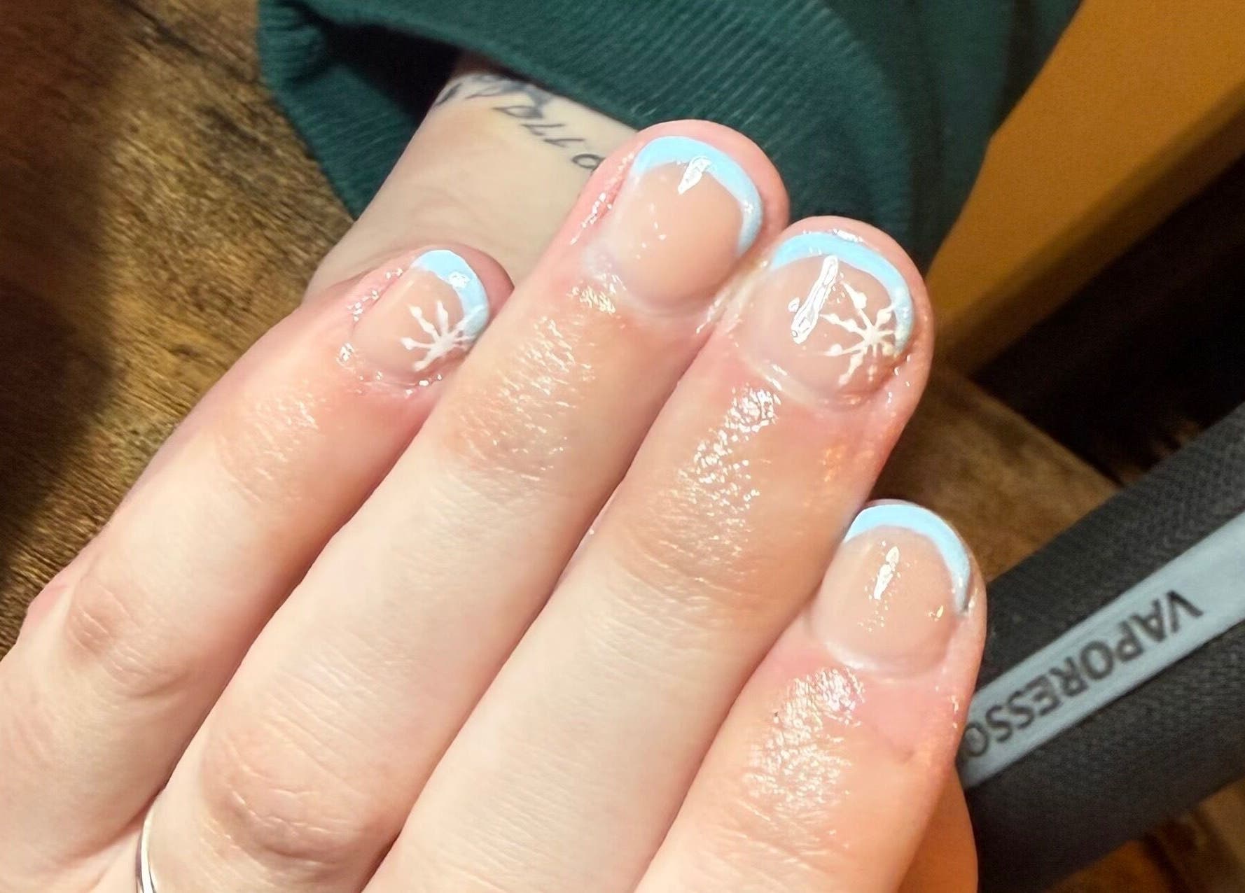 Elegant winter-themed nails at MK Nails & Beauty, Ballymoney, Northern Ireland, GB showcasing delicate frosty designs.