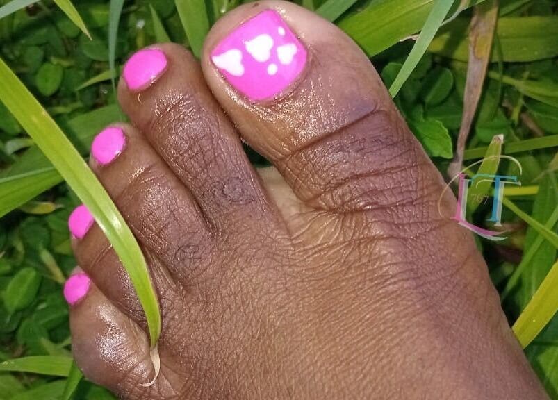 Bright pink toenail polish from LilysTouch767 in Saint David Parish, DM, showcasing expert pedicure services.