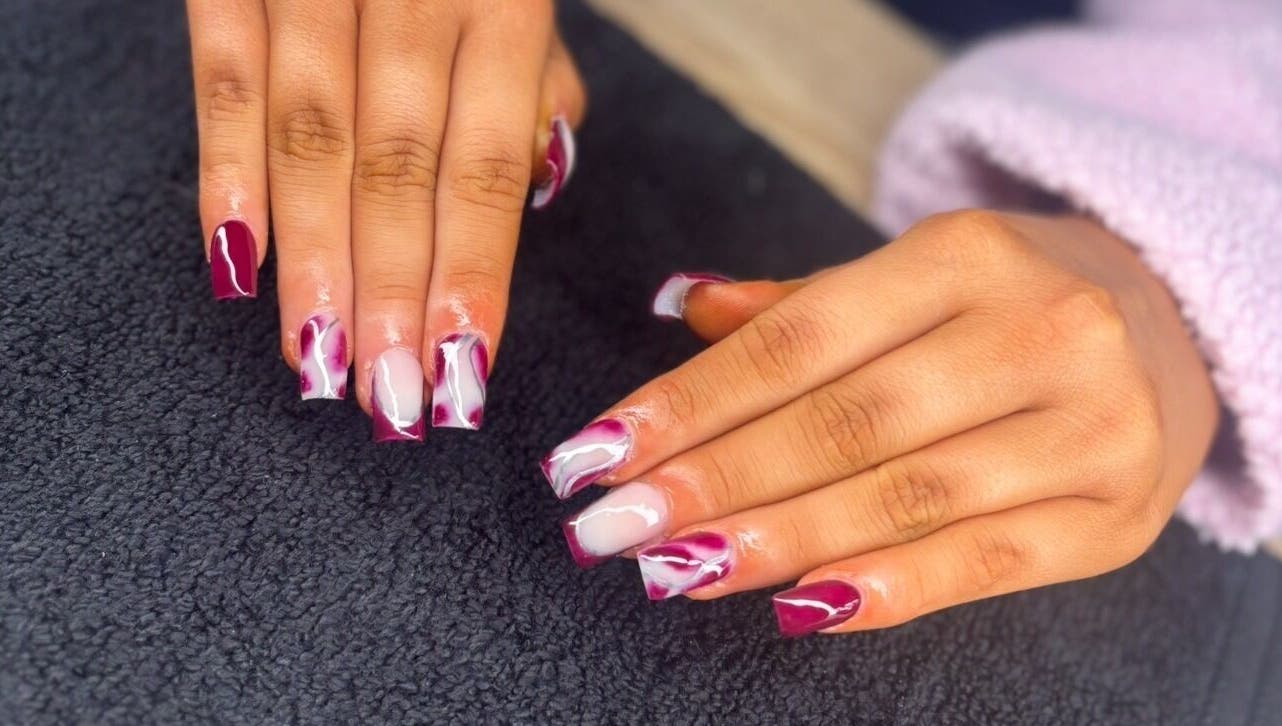 Stylish nail art with burgundy and white designs at Luxe beauty room, County Westmeath, County Westmeath, IE.