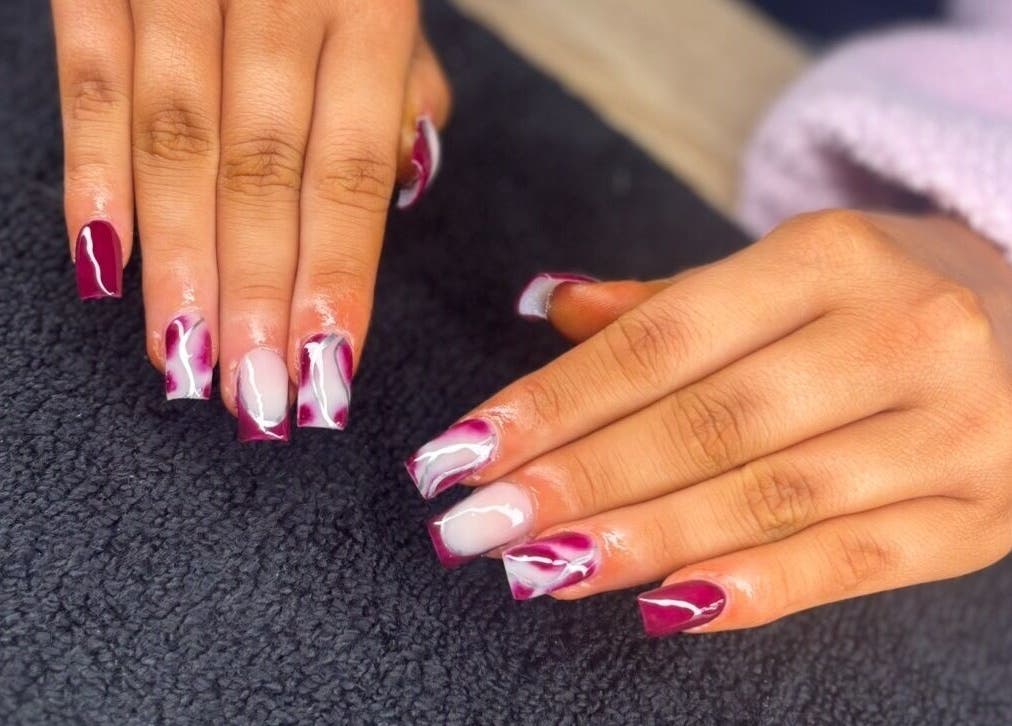 Stylish nail art with burgundy and white designs at Luxe beauty room, County Westmeath, County Westmeath, IE.