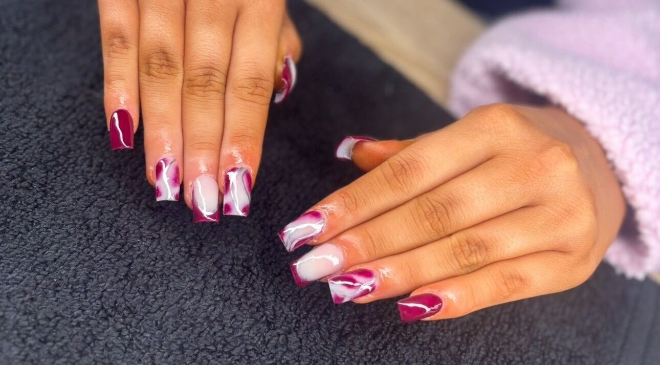 Stylish nail art with burgundy and white designs at Luxe beauty room, County Westmeath, County Westmeath, IE.