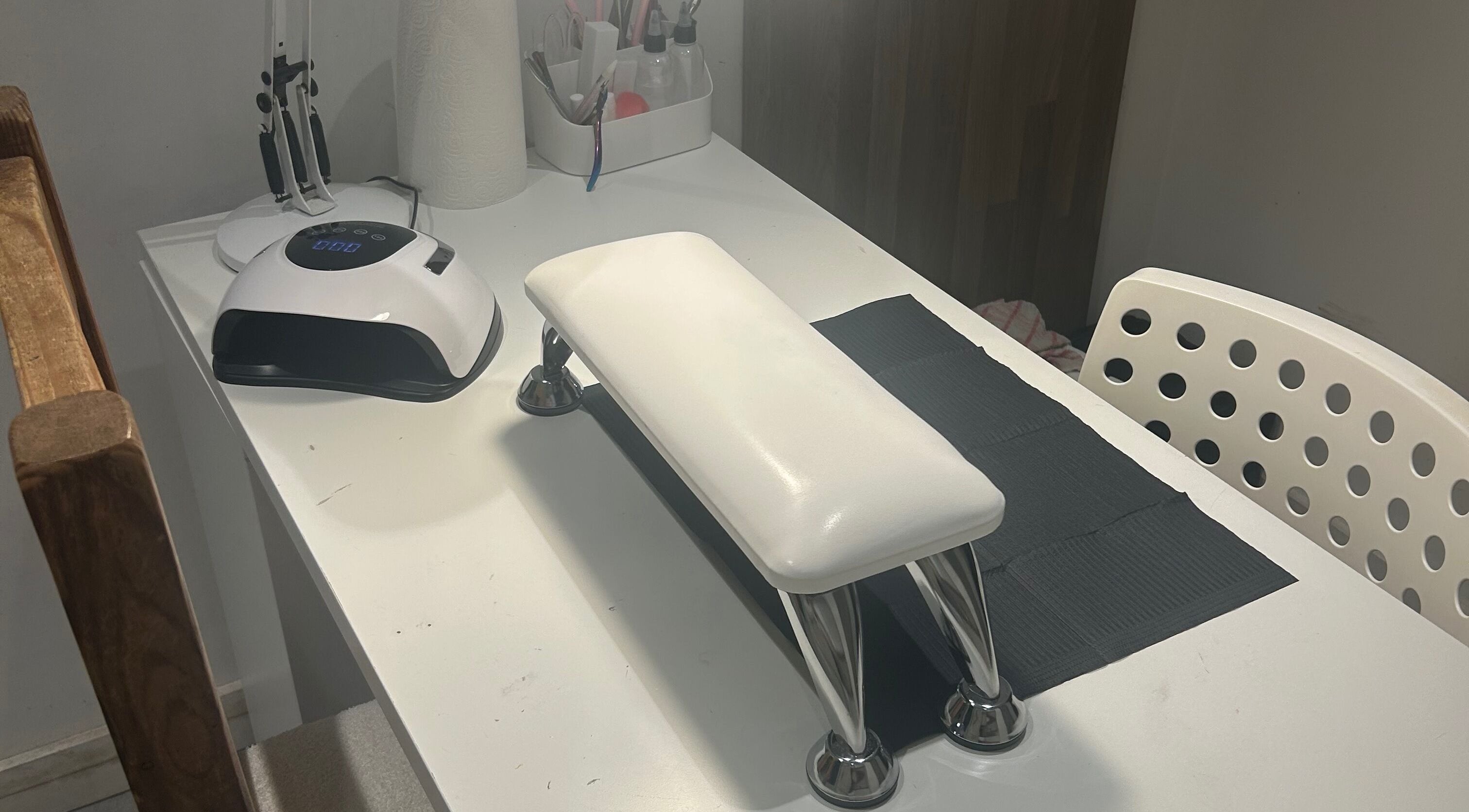 nai.lsbyemilia's sleek nail station in Saint Kew, England, GB, with modern tools and chic decor.