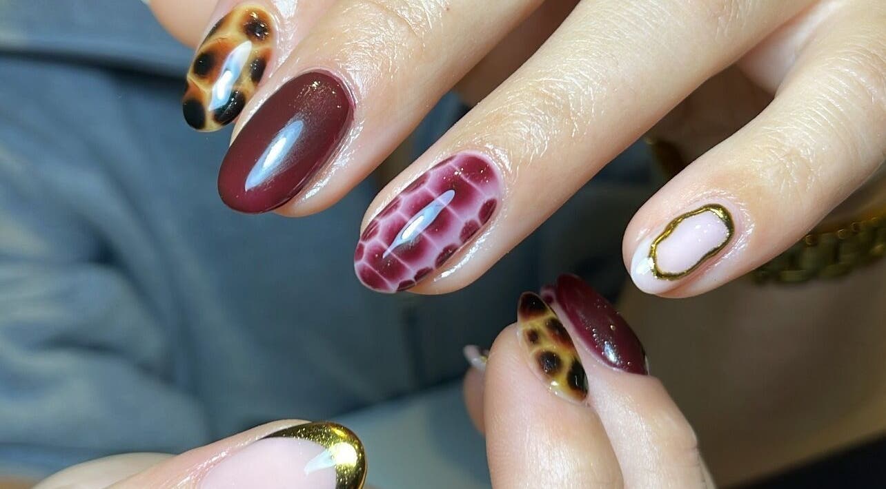 Stylish nail art with unique patterns by By Tayah in Bristol, England, GB.