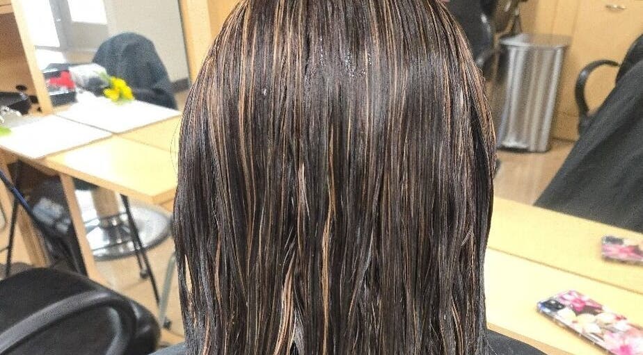 Brown hair with subtle highlights at Serene_Haven_Salon in Von Ormy, Texas, US.