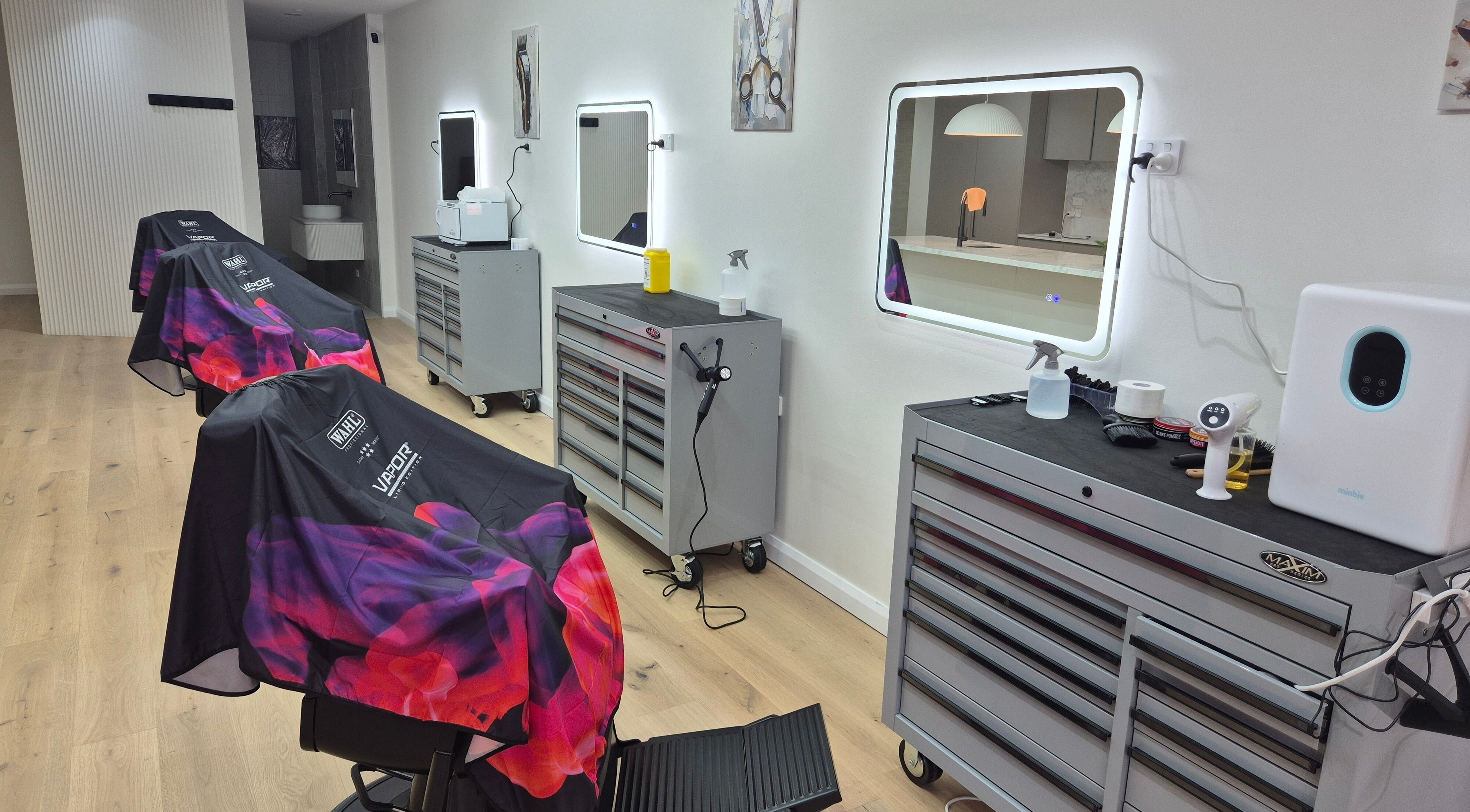 Modern barber stations at THE MANUAL BARBER, Braddon, Australian Capital Territory, AU with sleek design.