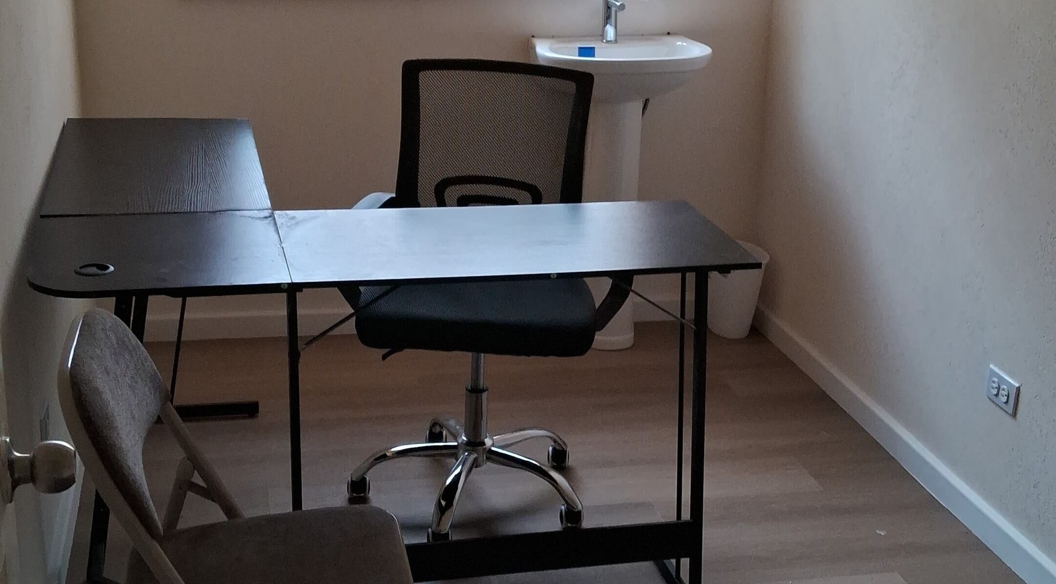 Office space with desk and chair at Dolizanel Medical, Oistins, Christ Church, BB.