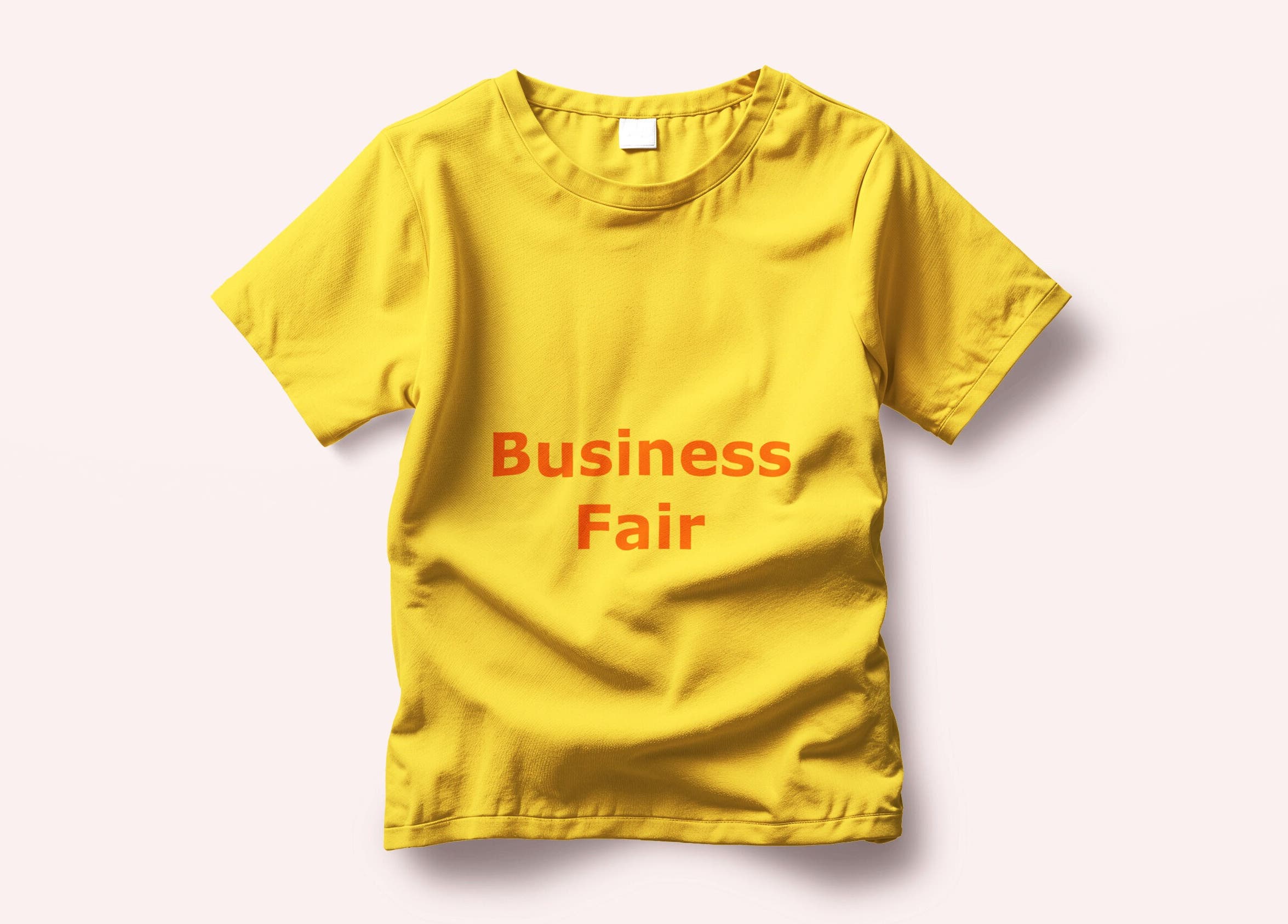 Yellow T-shirt with 'Business Fair' text, representing Test Business, Bad Mergentheim, Baden-württemberg, DE.