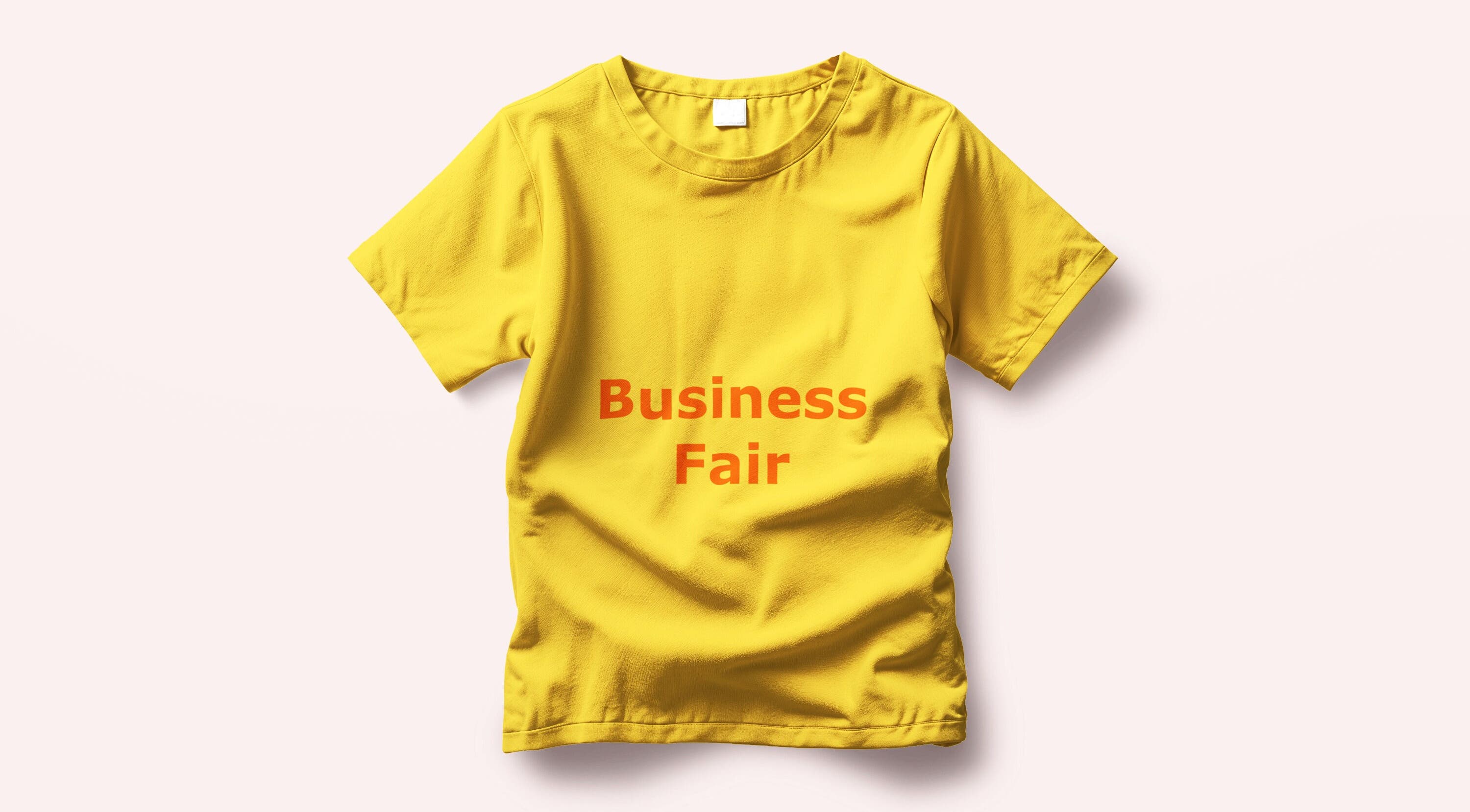 Yellow T-shirt with 'Business Fair' text, representing Test Business, Bad Mergentheim, Baden-württemberg, DE.