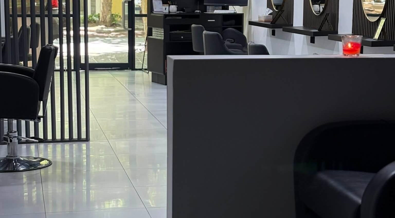 Elegant interior of Yasu Hair, Perth, Western Australia, AU, showcasing modern chairs and decor.