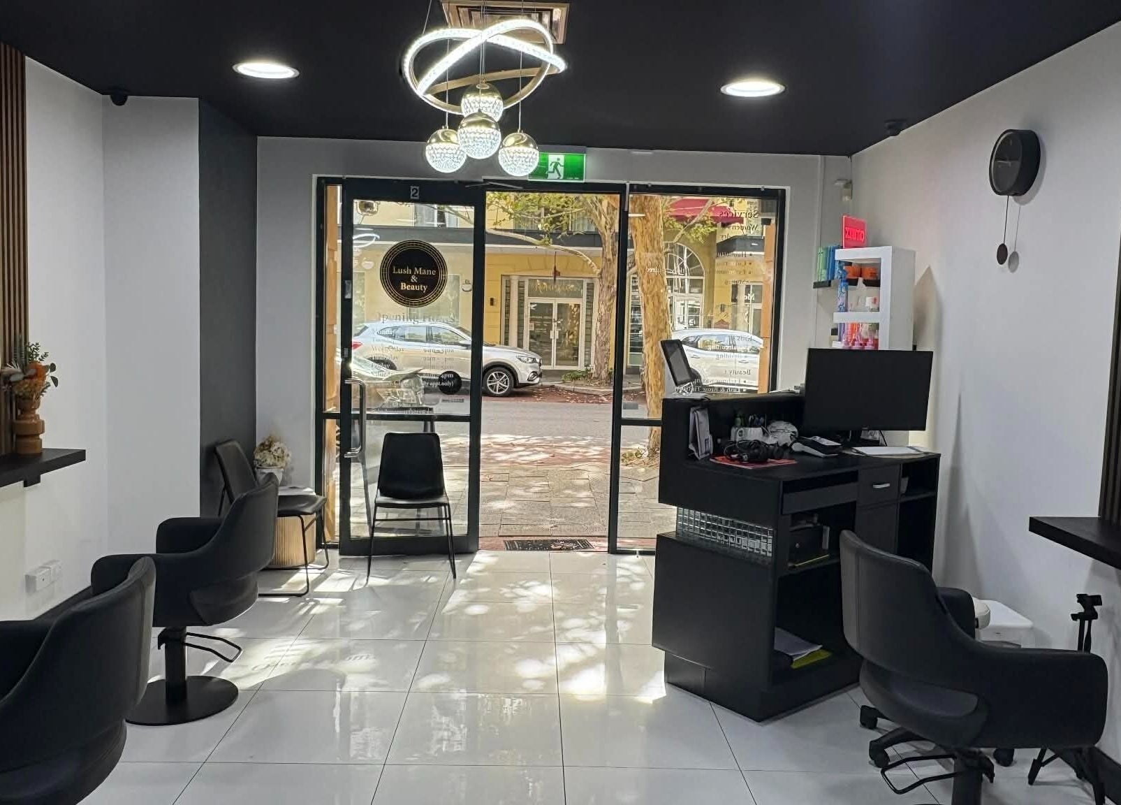 Elegant salon chairs and mirrors at Yasu Hair in Perth, Western Australia, AU. Modern and inviting space.